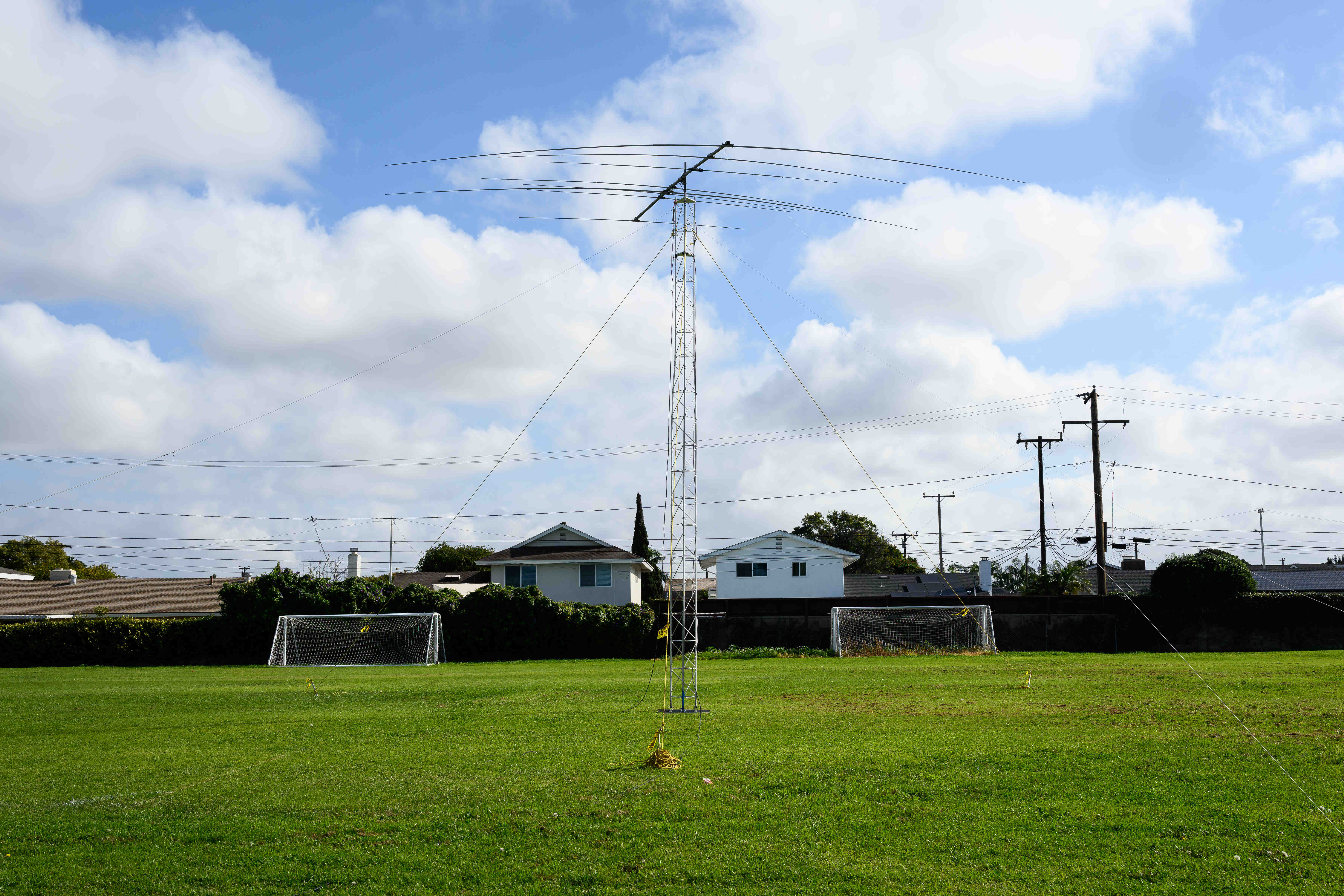 A 30-foot-high antenna is set up on a middle school...