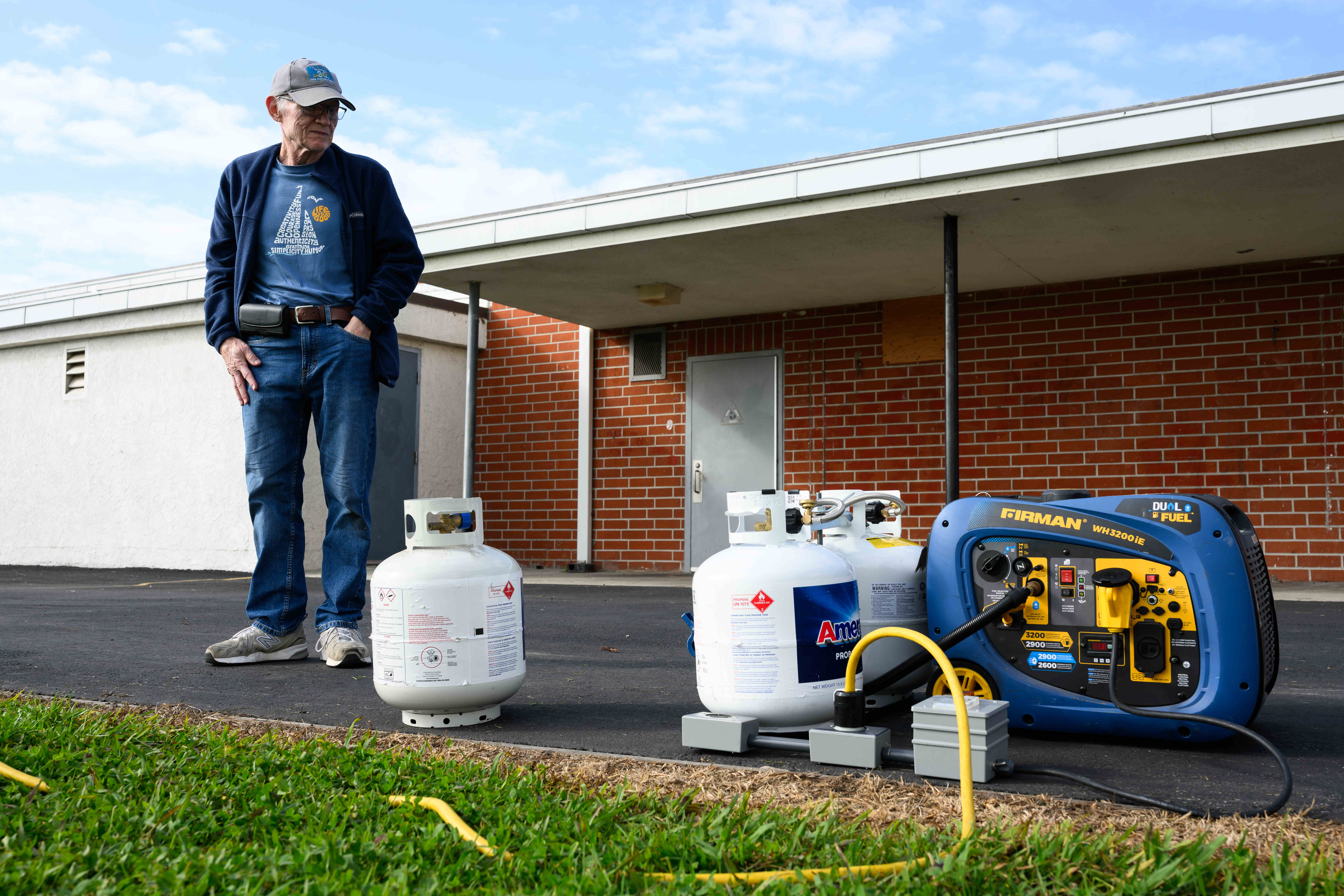 John Gabler examines a generator for the Orange County Amateur...