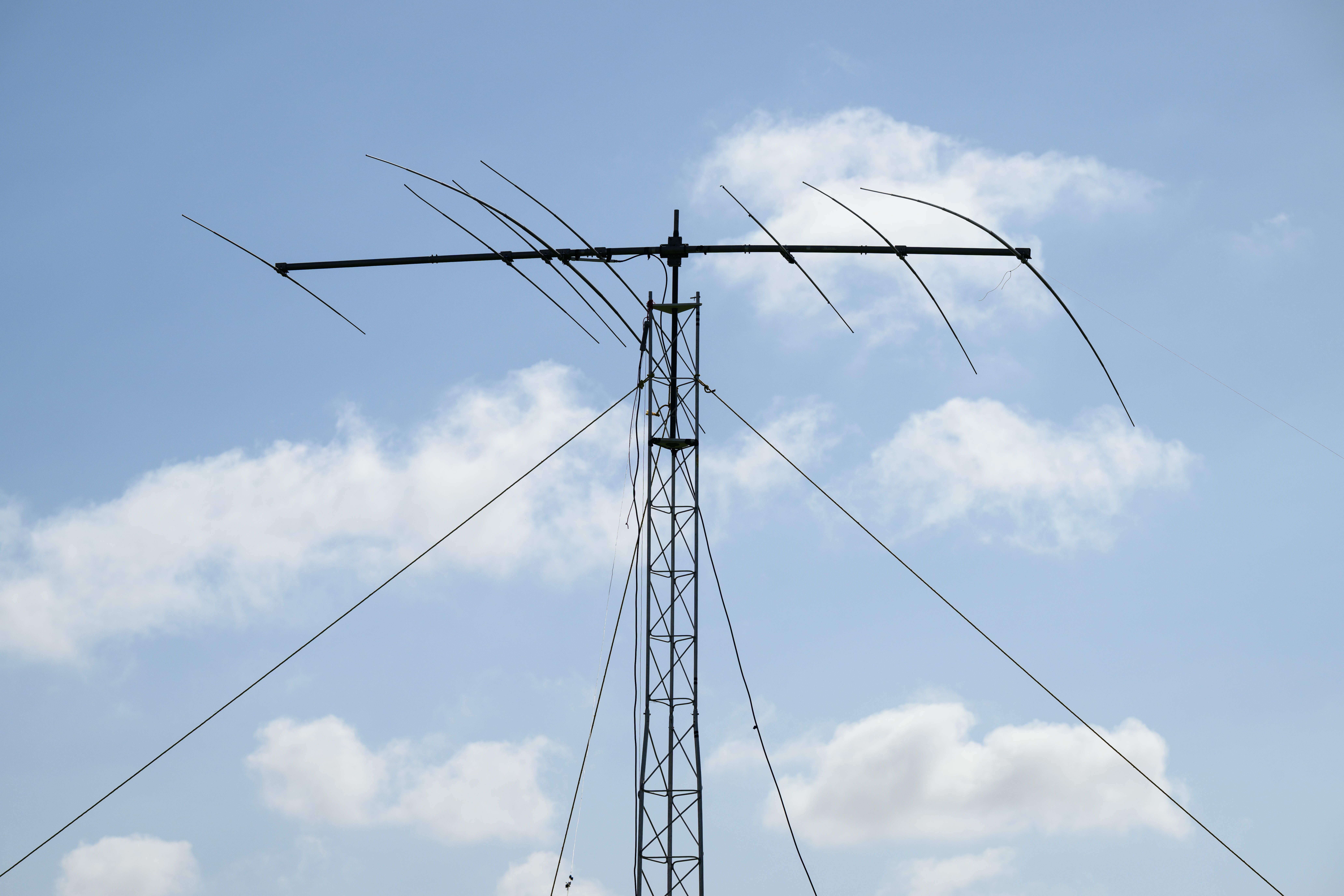 A 30-foot-high antenna is set up on a middle school...