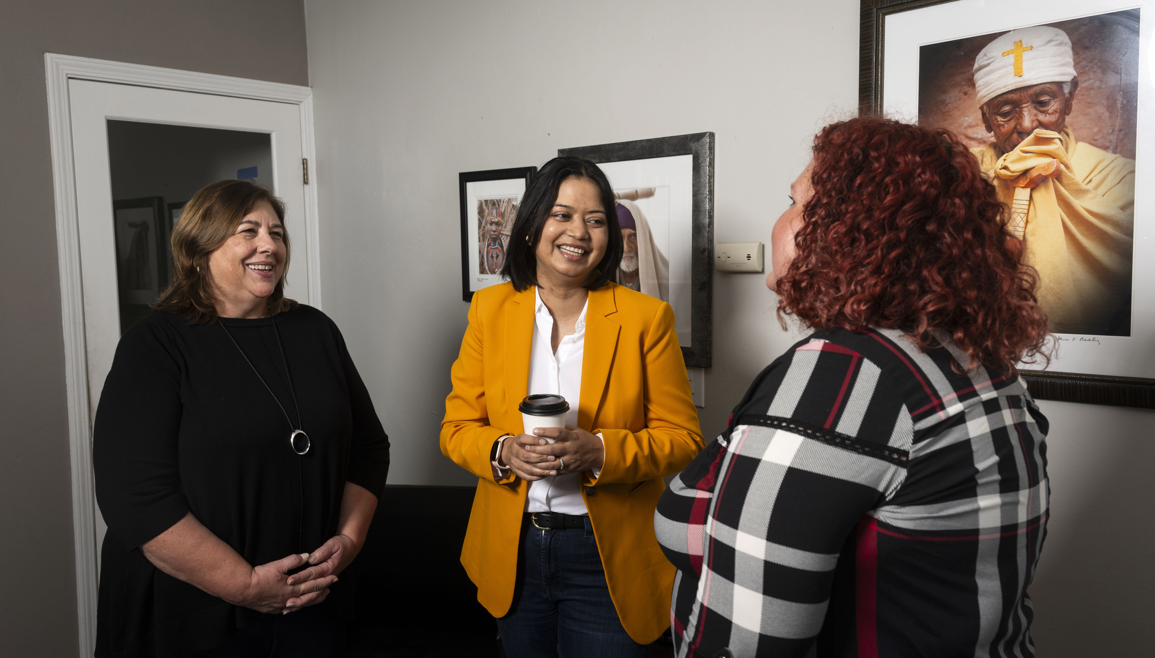 Dawn Price and incoming CEO Nishtha Mohendra, from left, talk...