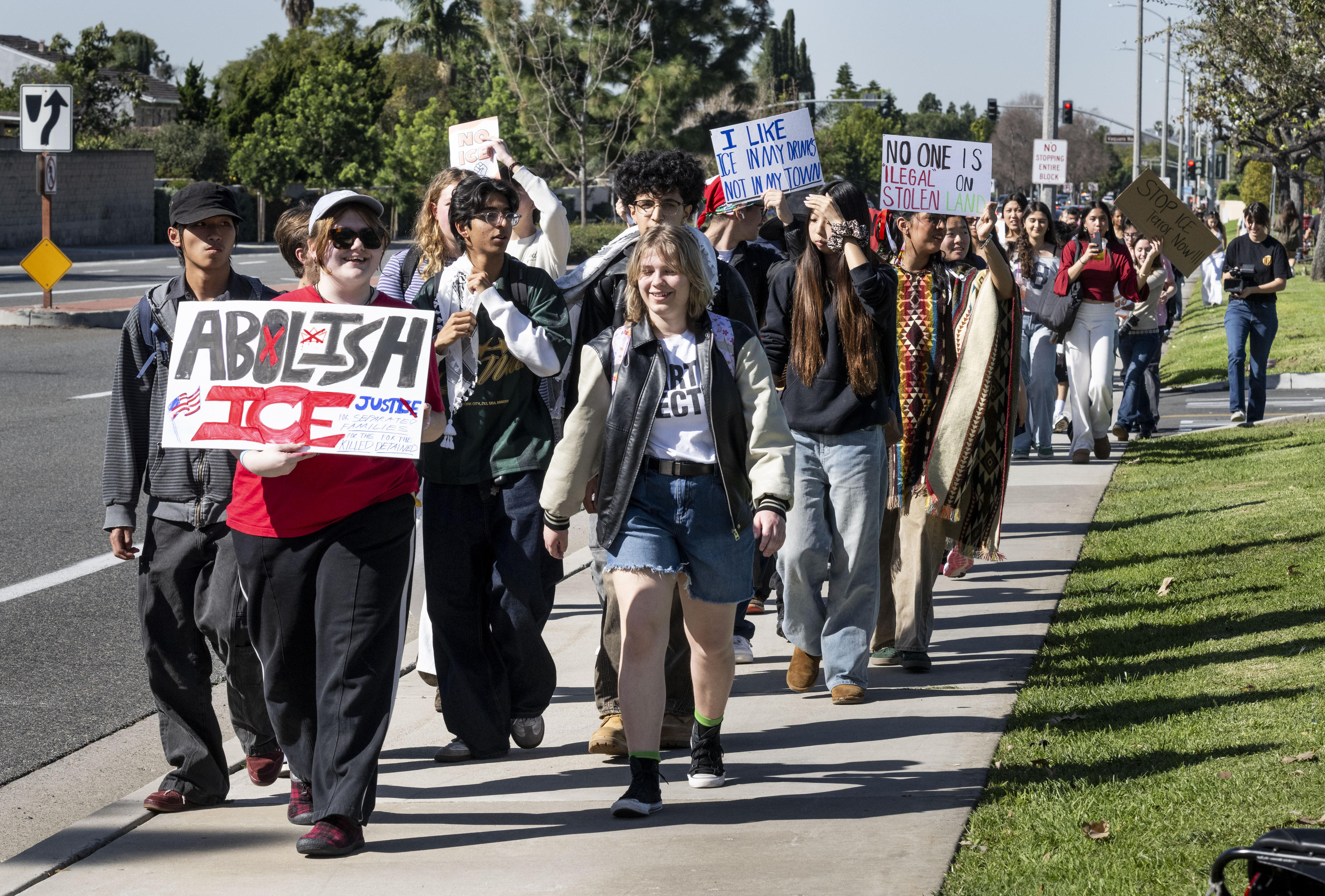 Students at Irvine High School staged a walkout in Irvine,...