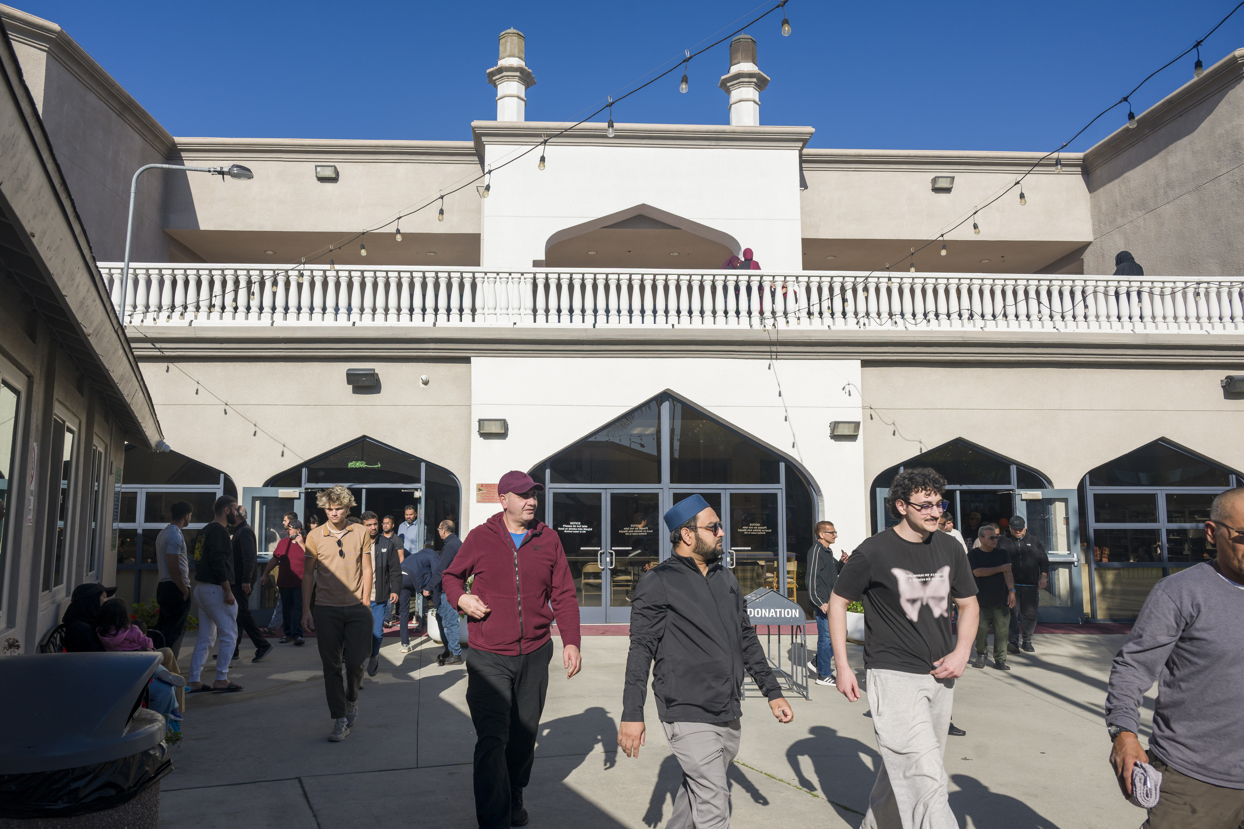 Muslims leave the Islamic Society of Orange County after prayer...