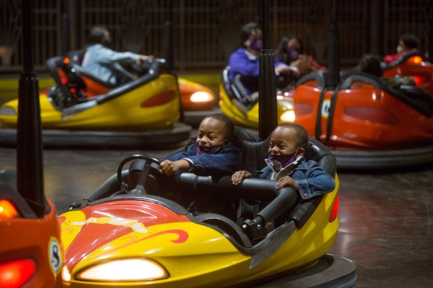 From left, six-year-old Blake Gorman and five-year-old Bryce Gorman enjoy the Wheeler Dealer Bumper Cars ride at Knott's Berry Farm on Thursday, May 20, 2021. (Photo by Drew A. Kelley, Contributing Photographer)
