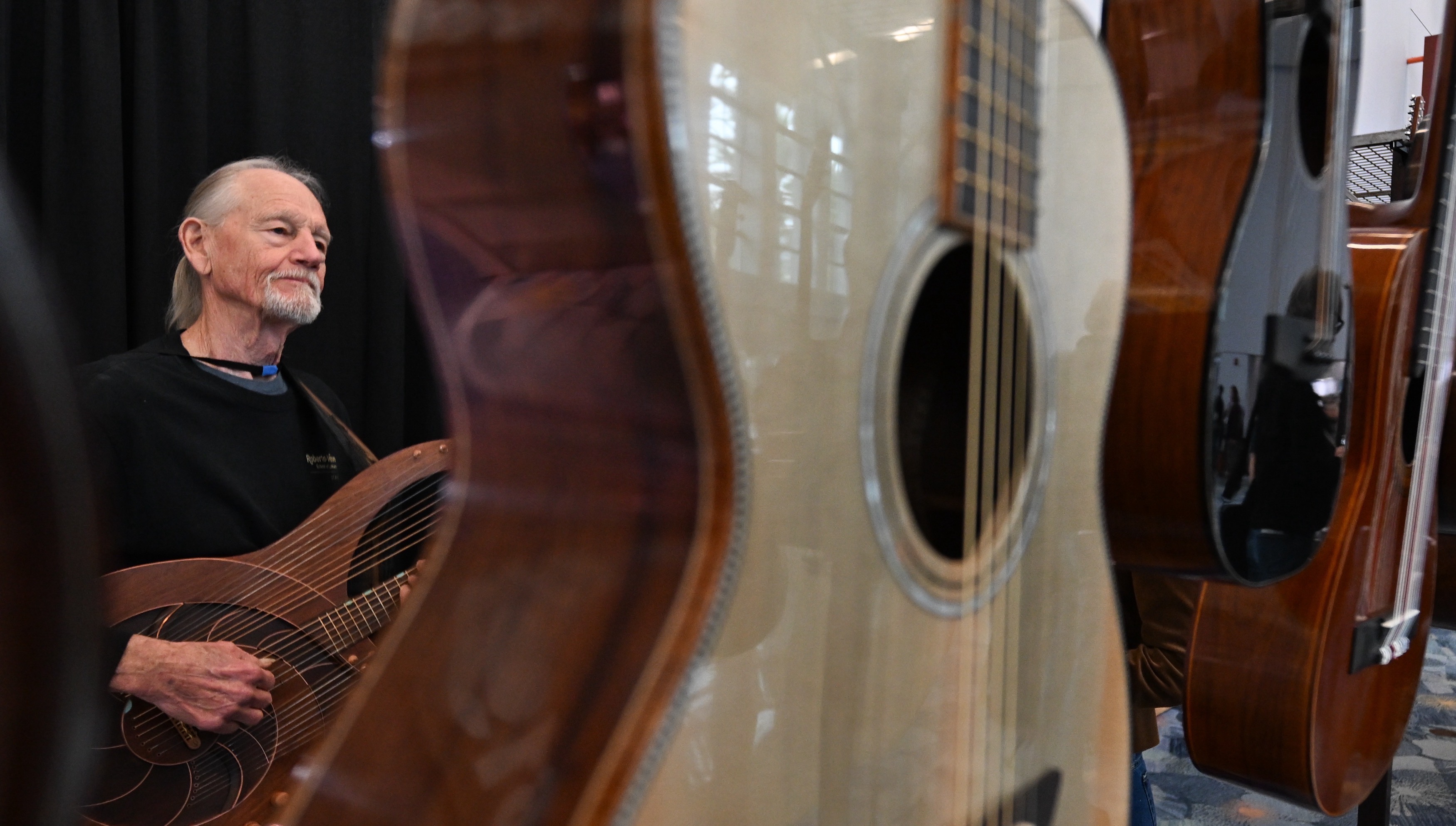 William Eaton, director of the Roberto-Venn School of Luthiery plays...