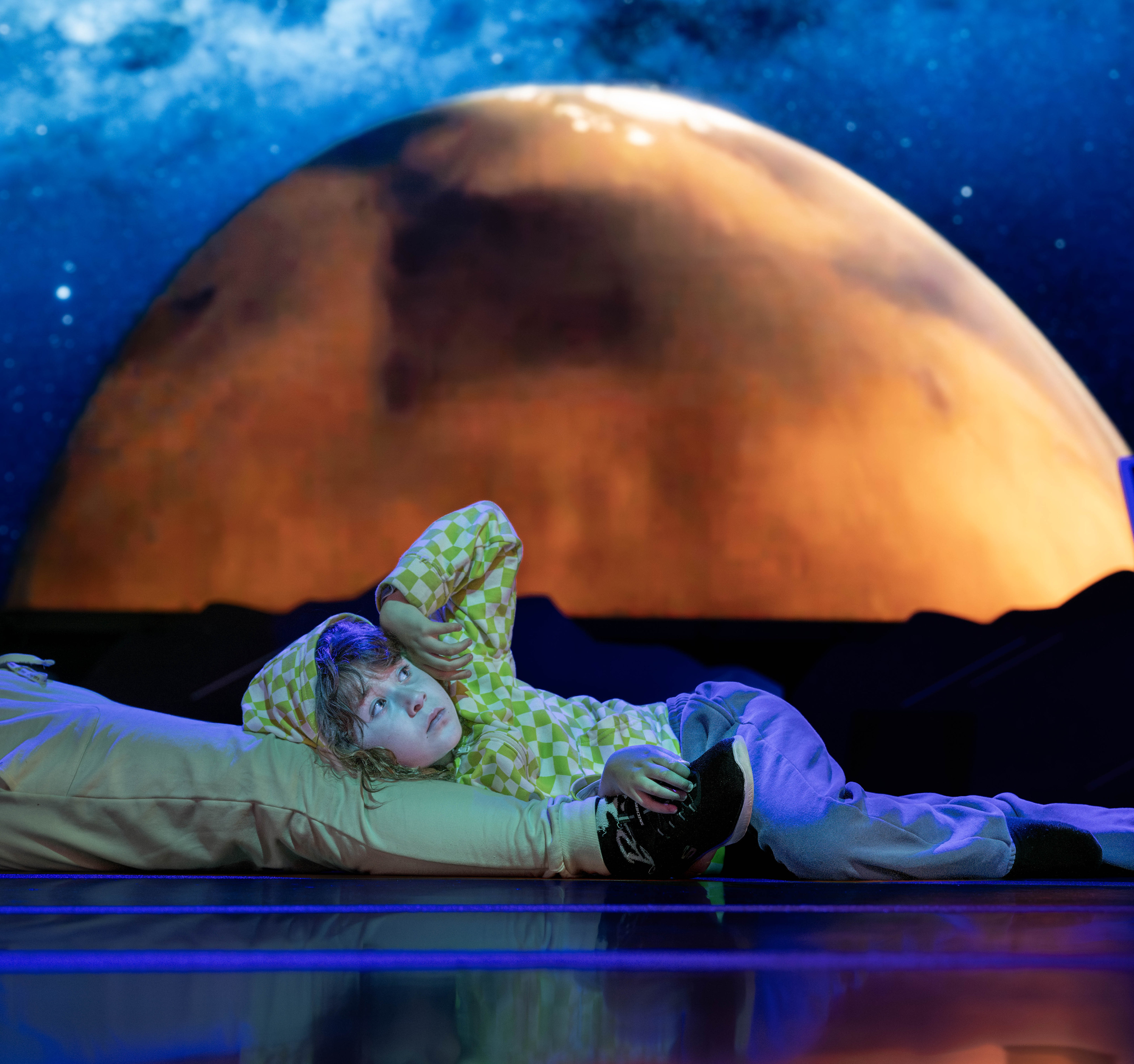 Danitza Casallas provides a comfortable resting spot for son, Luke,...