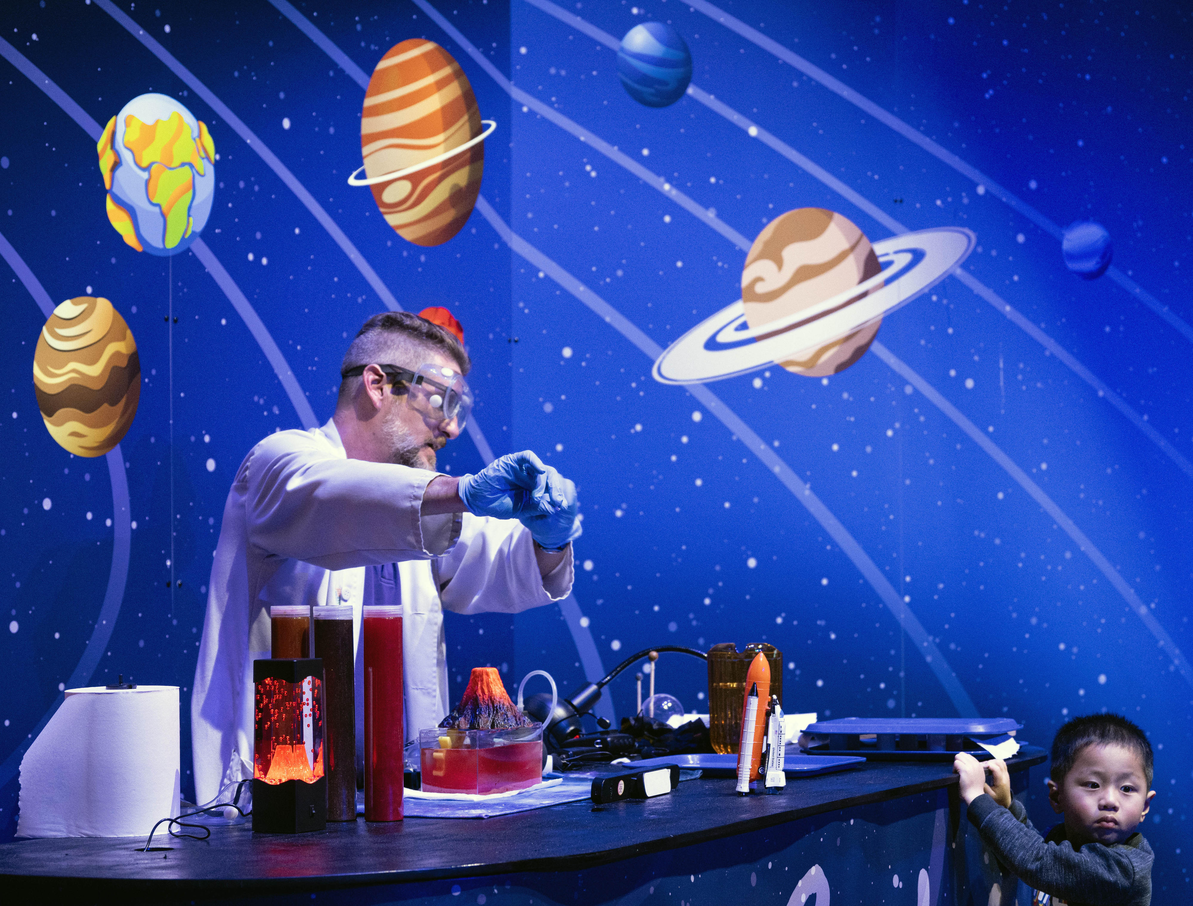 Luke Brunold teaches about volcanoes during Discovery Cube’s Solar System...