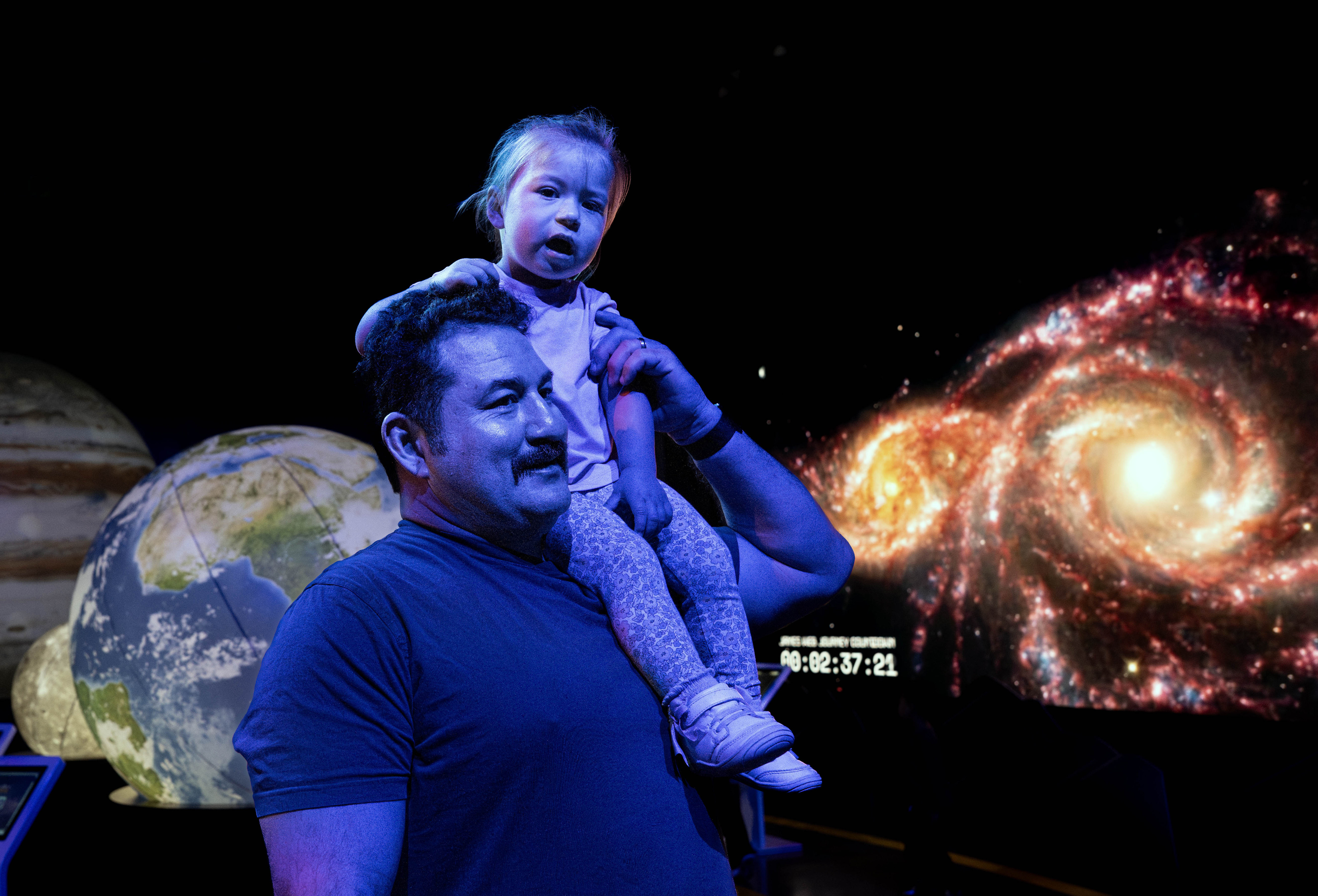 Joseph Madrid and his daughter Hannah, 2, of Newport Beach,...