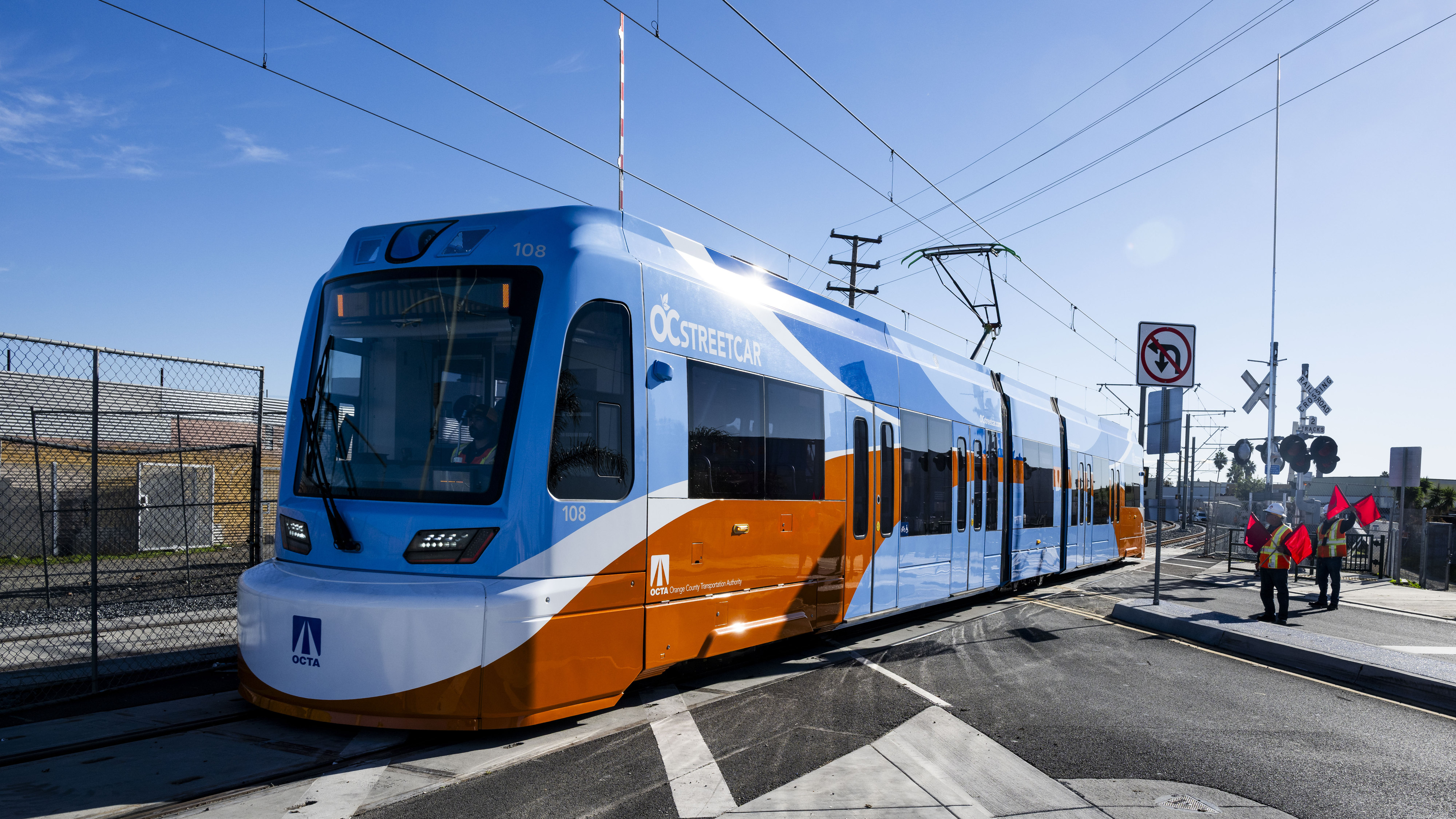 An OC Streetcar train crosses W. 5th Street in Santa...