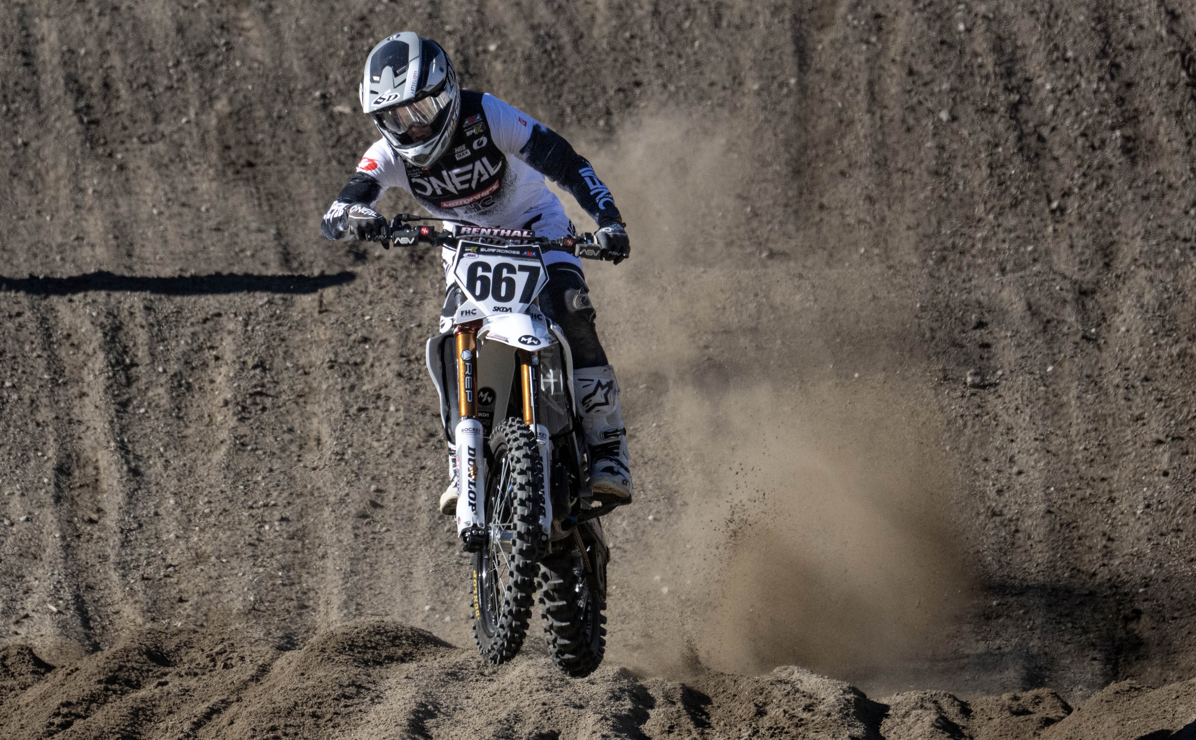 Anton Nordstrom kicks up dirt during the qualifying round of...