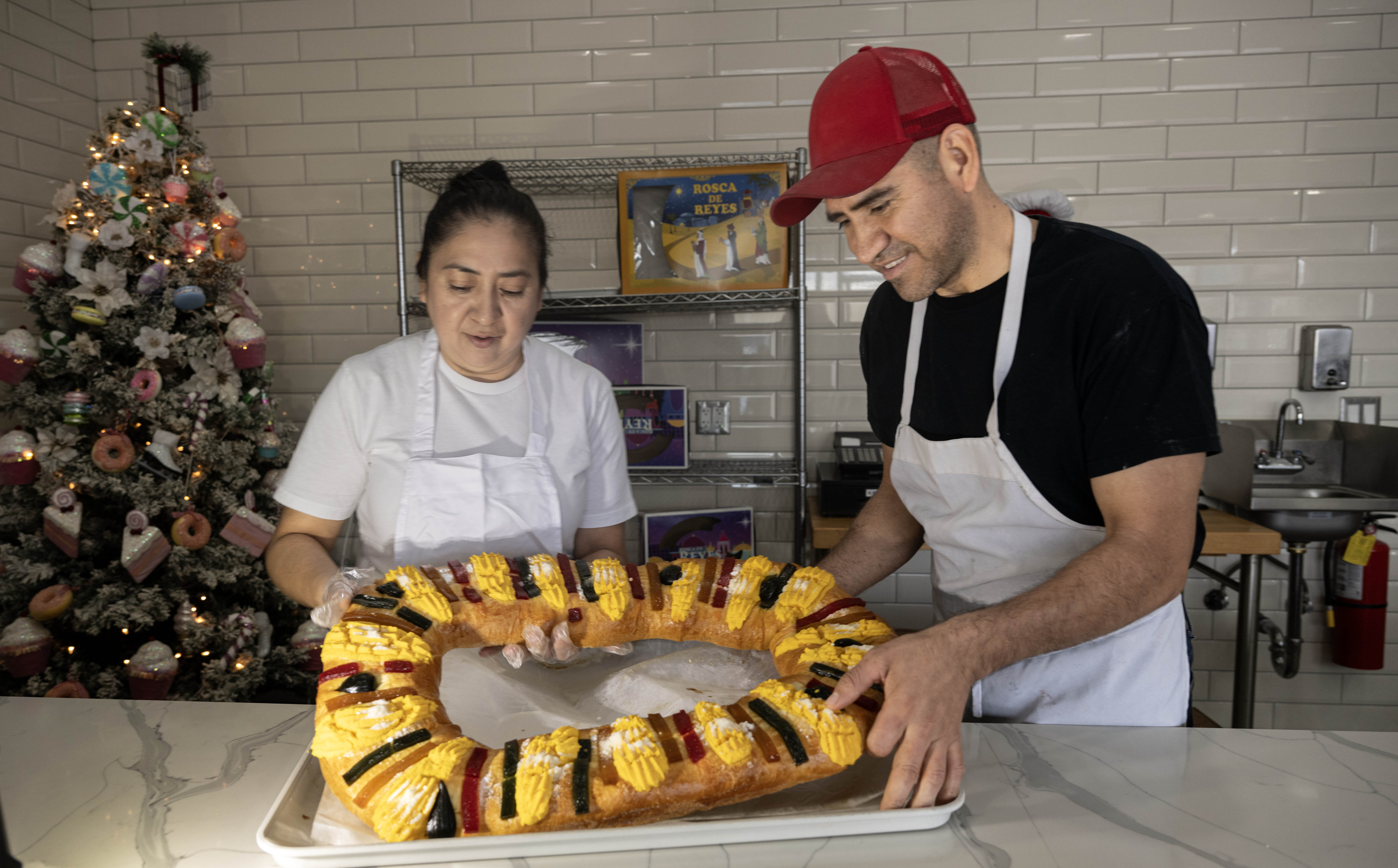 Carmen Mendoza and her brother-in-law, Jovian Mendoza, show off their...
