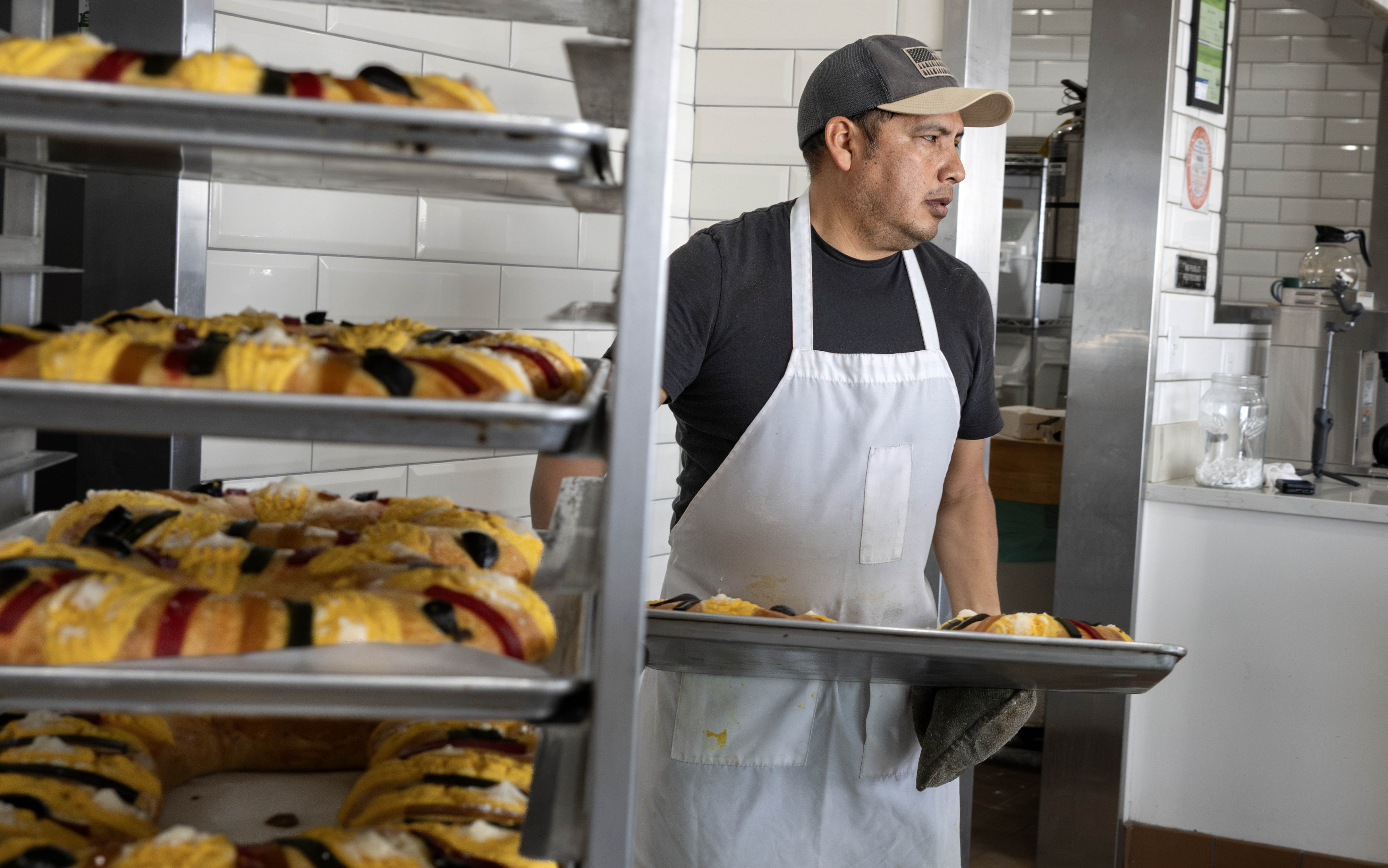 Antonio Rodriguez gets ready to box up Three Kings Bread...