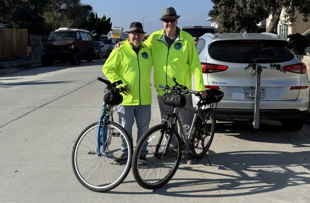 Chris Stoefen and his father, Gary Stoefen, ready to head out on their bicycles to interview people for "Keepin It Real." (Courtesy of Gary Stoefen)