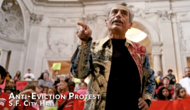 A man pointing at something.