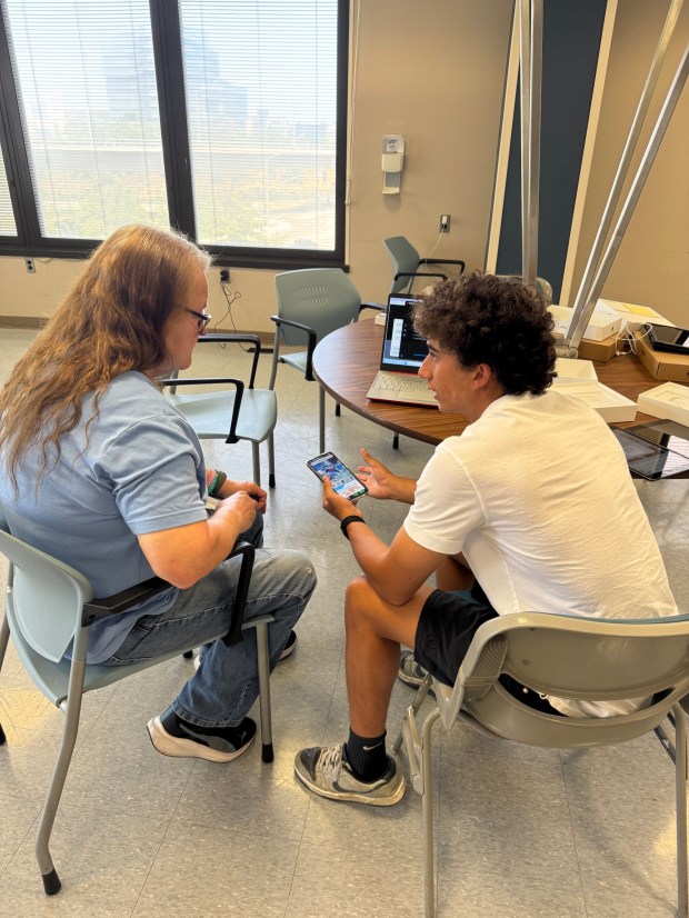 Tech-Angel co-founder Keanu Seeliger provides tech tutoring at the VA Medical Center. (Dimple Shah)