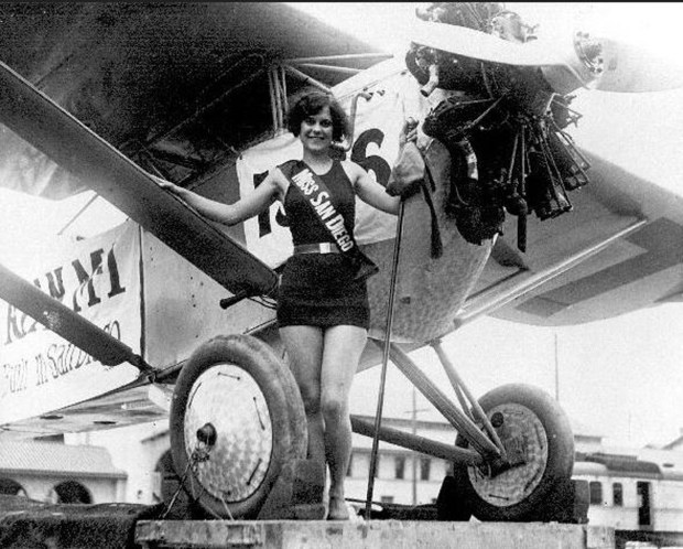 Miss San Diego poses with a Ryan M-1 in 1929. (Ryan Aeronautical Corp.)