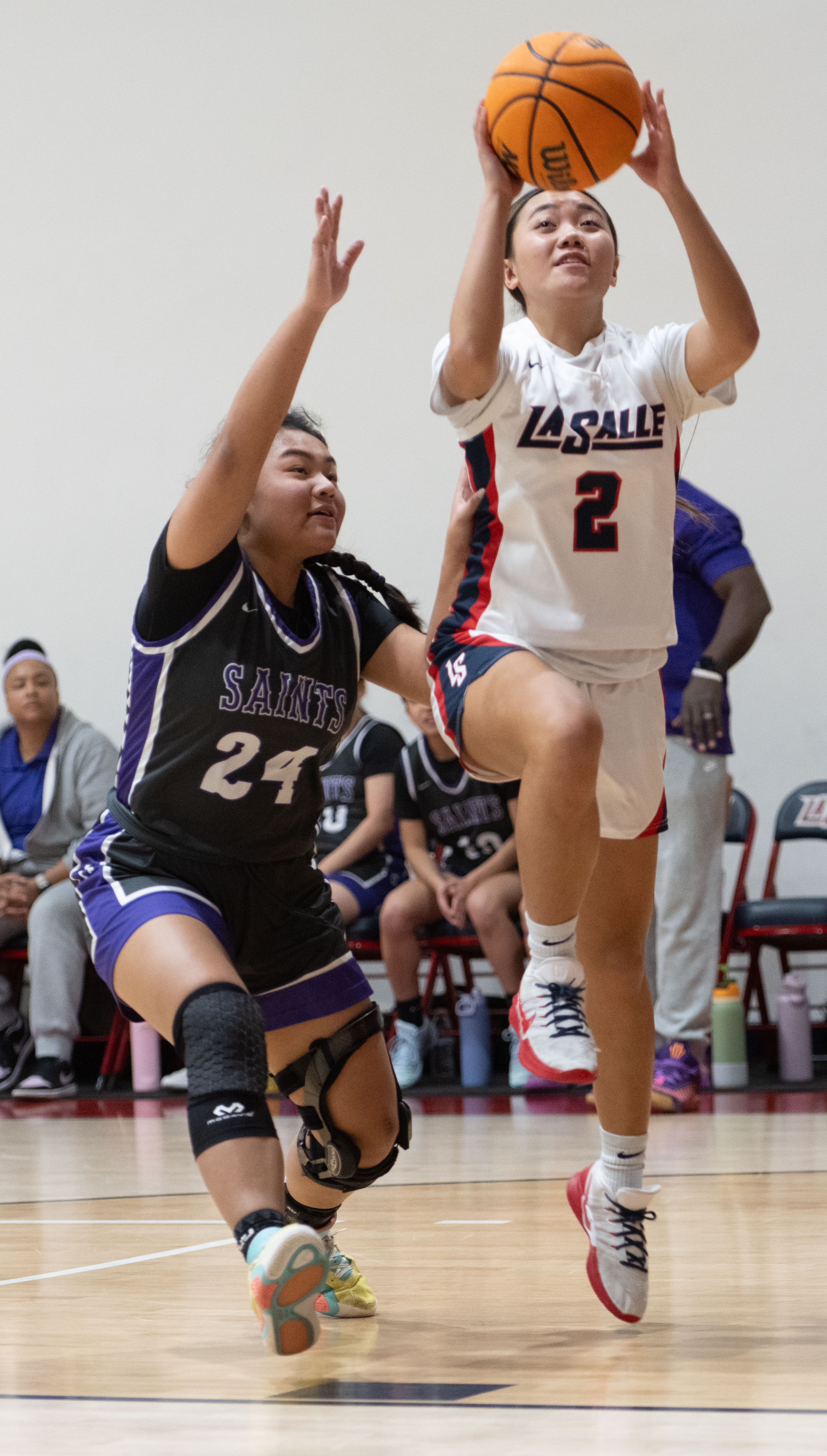 La Salle’s Maddy Chiang puts the ball up past St....