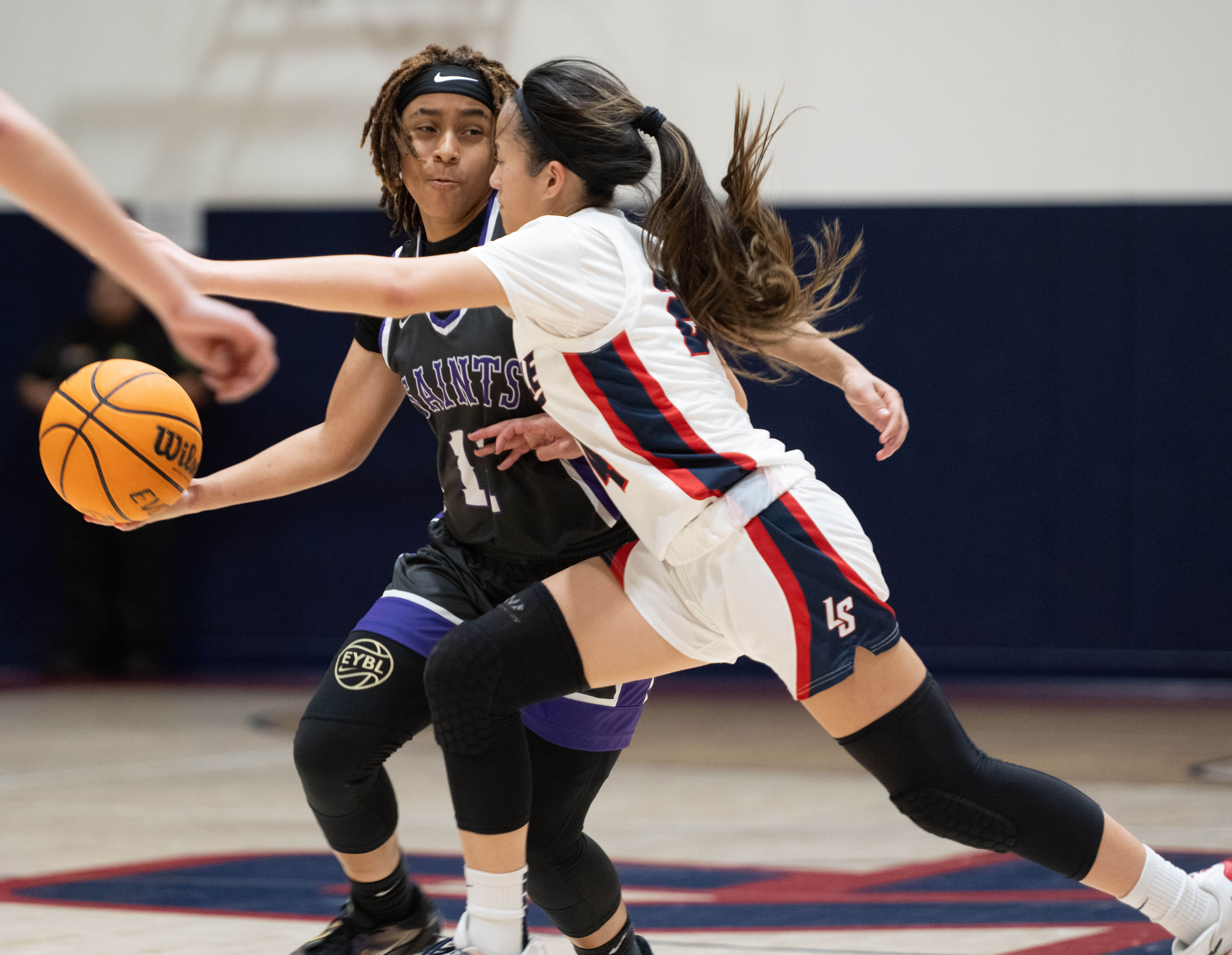 St. Anthony’s Jordyn Washington is pressured by La Salle’s Emily...