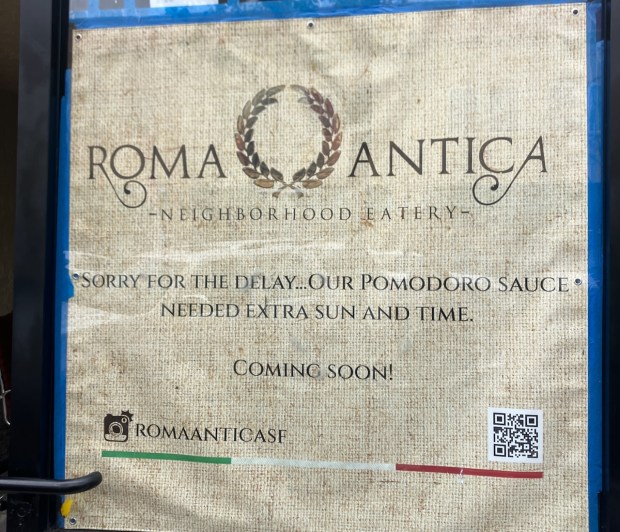 Roma Antica, a popular Italian restaurant in San Francisco, has a new location coming soon to San Mateo, as seen from this window announcement. (Kate Bradshaw/Bay Area News Group)