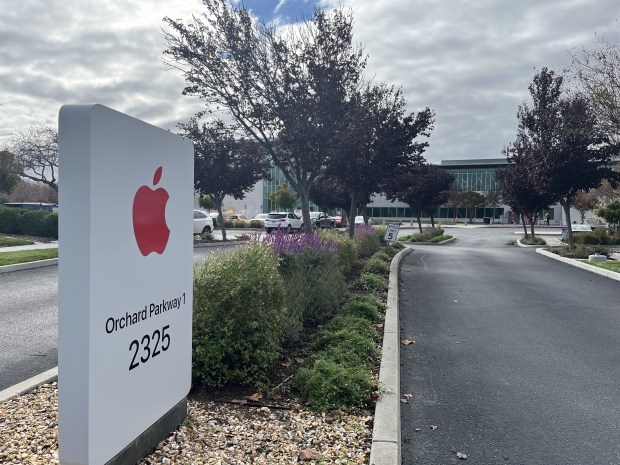 Apple logo is next to the driveway for 2325 Orchard Parkway in north San Jose, as seen in November 2025.(George Avalos/Bay Area News Group)