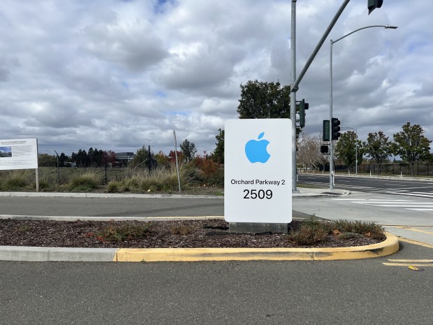 Apple logo is visible near an office building at 2509 Orchard Parkway in north San Jose, as seen in November 2025.(George Avalos/Bay Area News Group)
