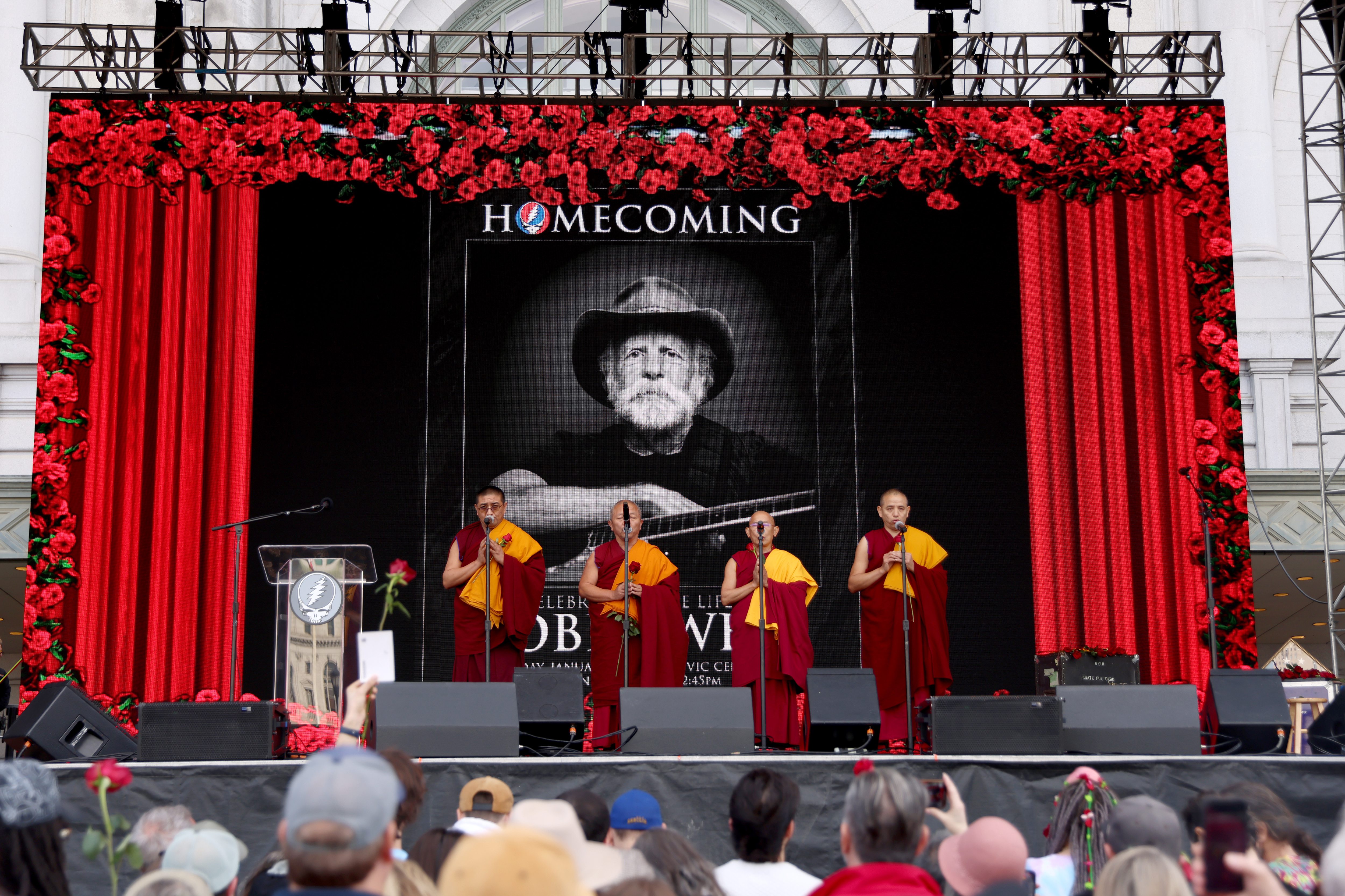 Buddhist monks chant at the Bob Weir memorial at Civic...