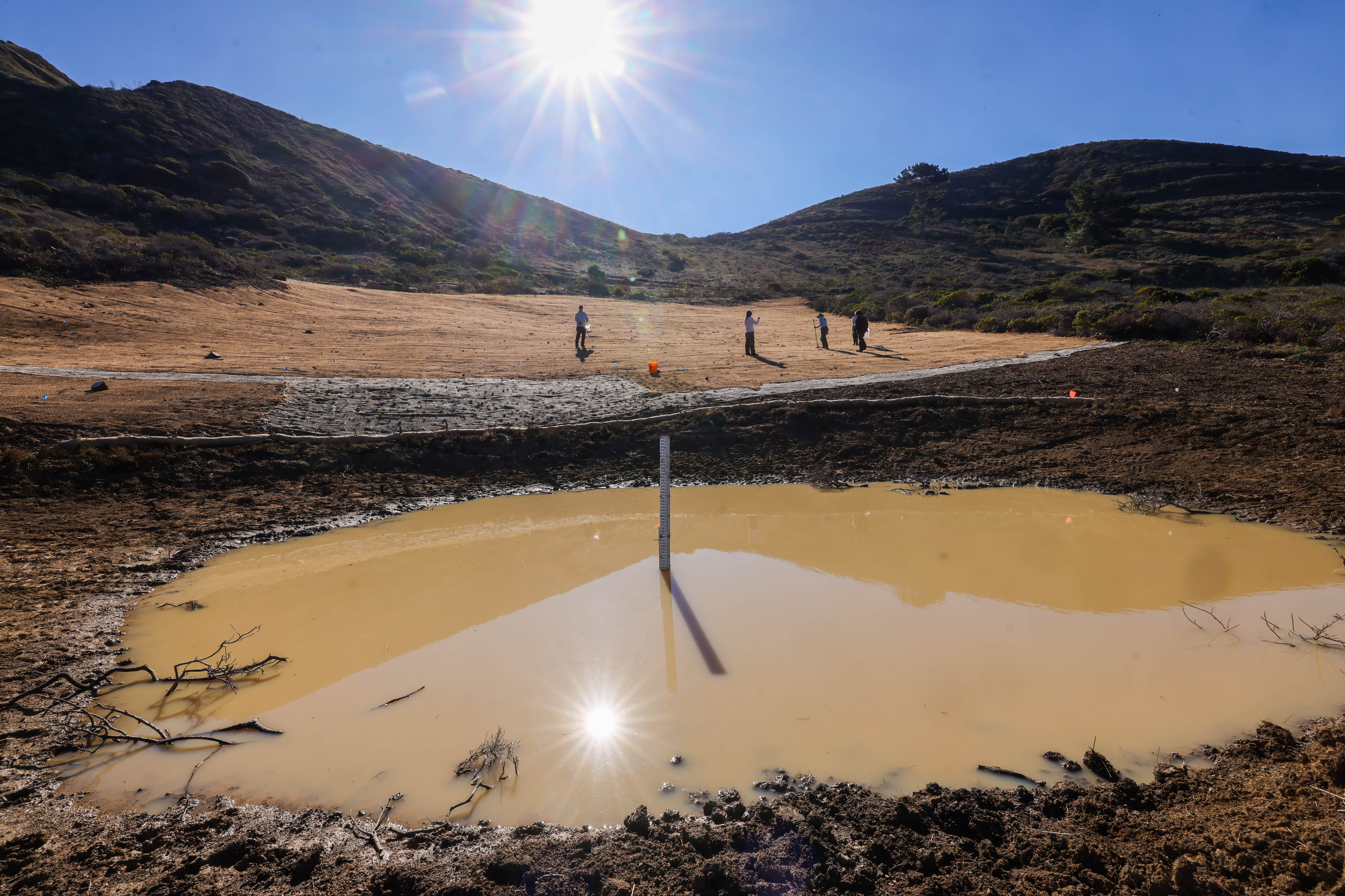Golden Gate National Recreation Area staff and apprentice partners work...