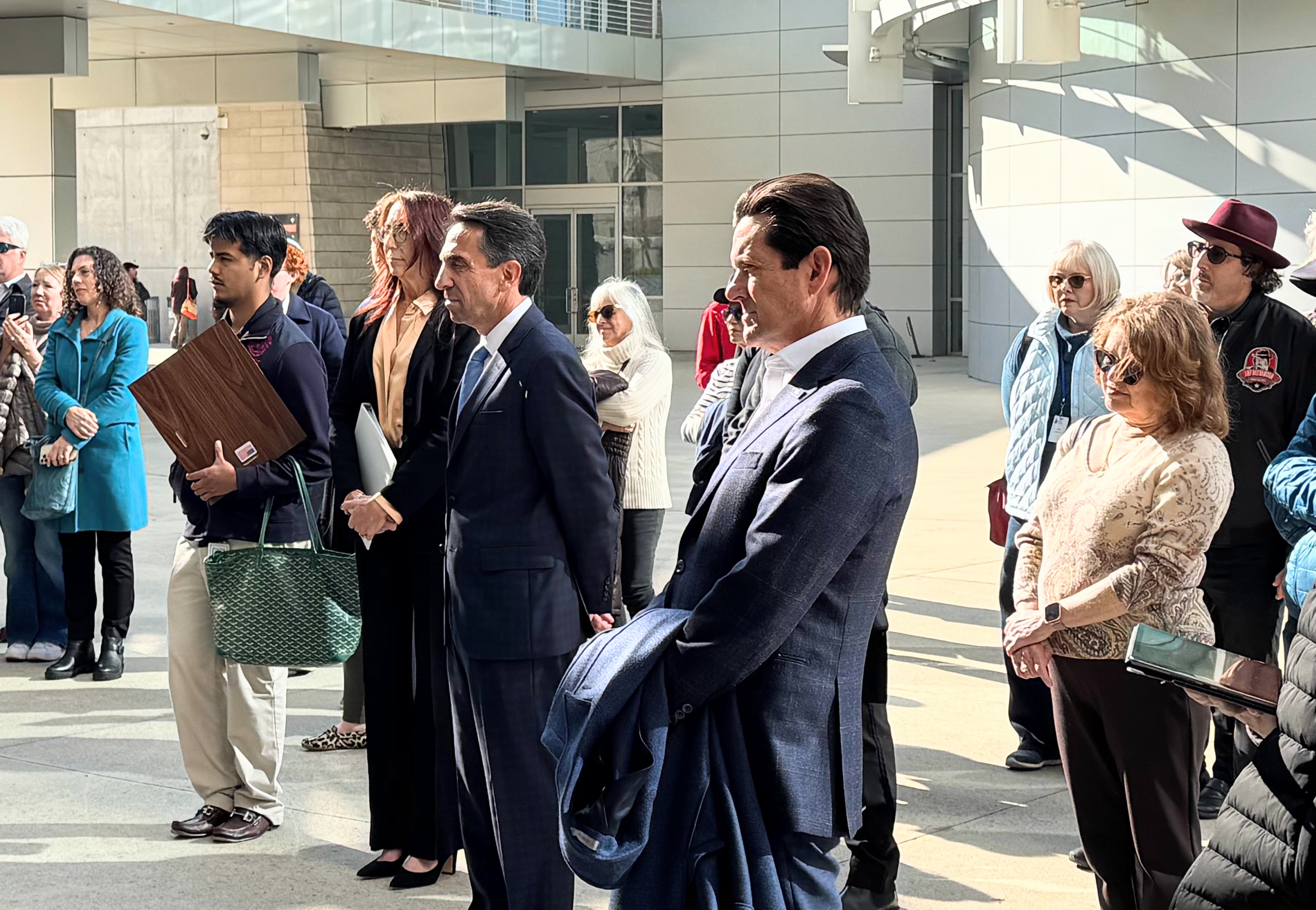 San Jose City Councilmember Michael Mulcahy, right, Santa Clara County...
