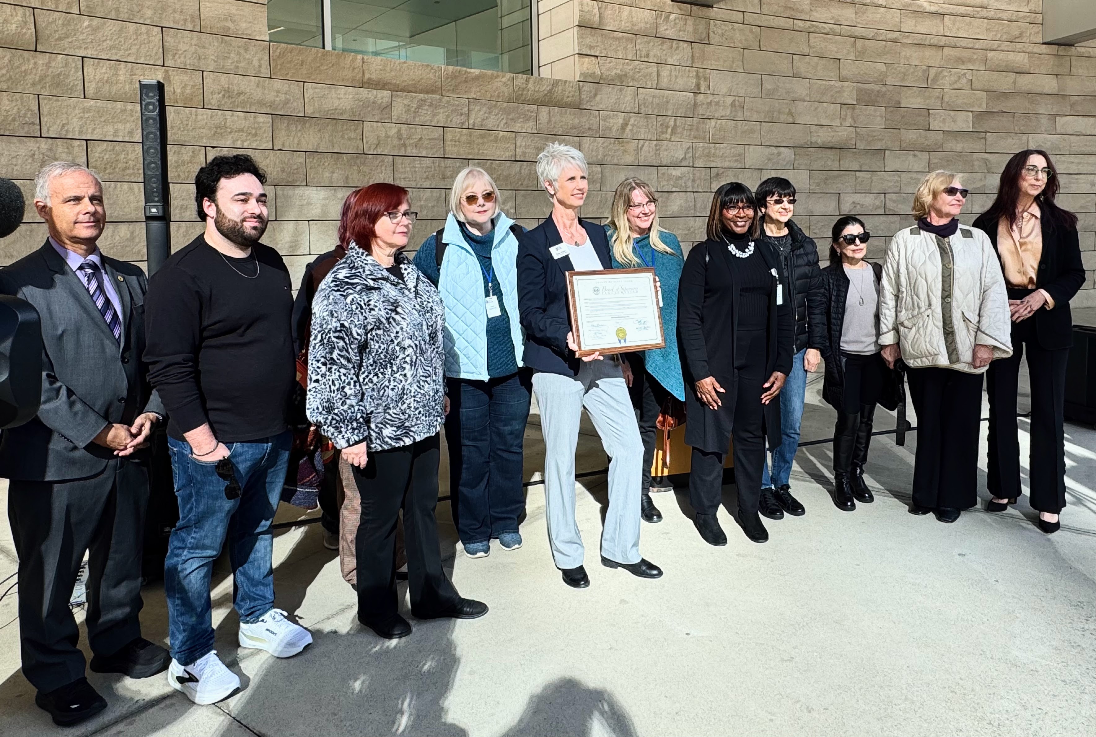 Jewish Family Services of Silicon Valley CEO Susan Frazer, holding...