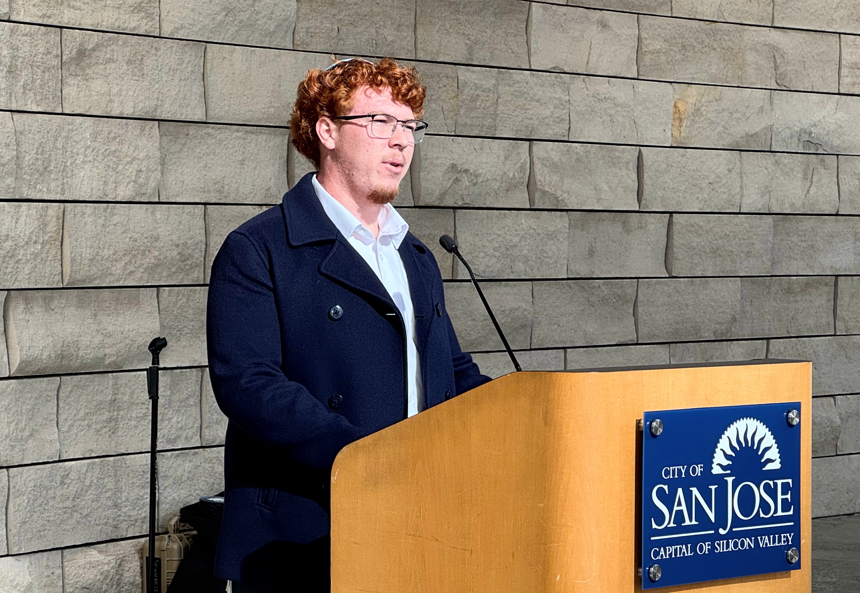Branham High School senior Cormac Nolan reads a letter he...