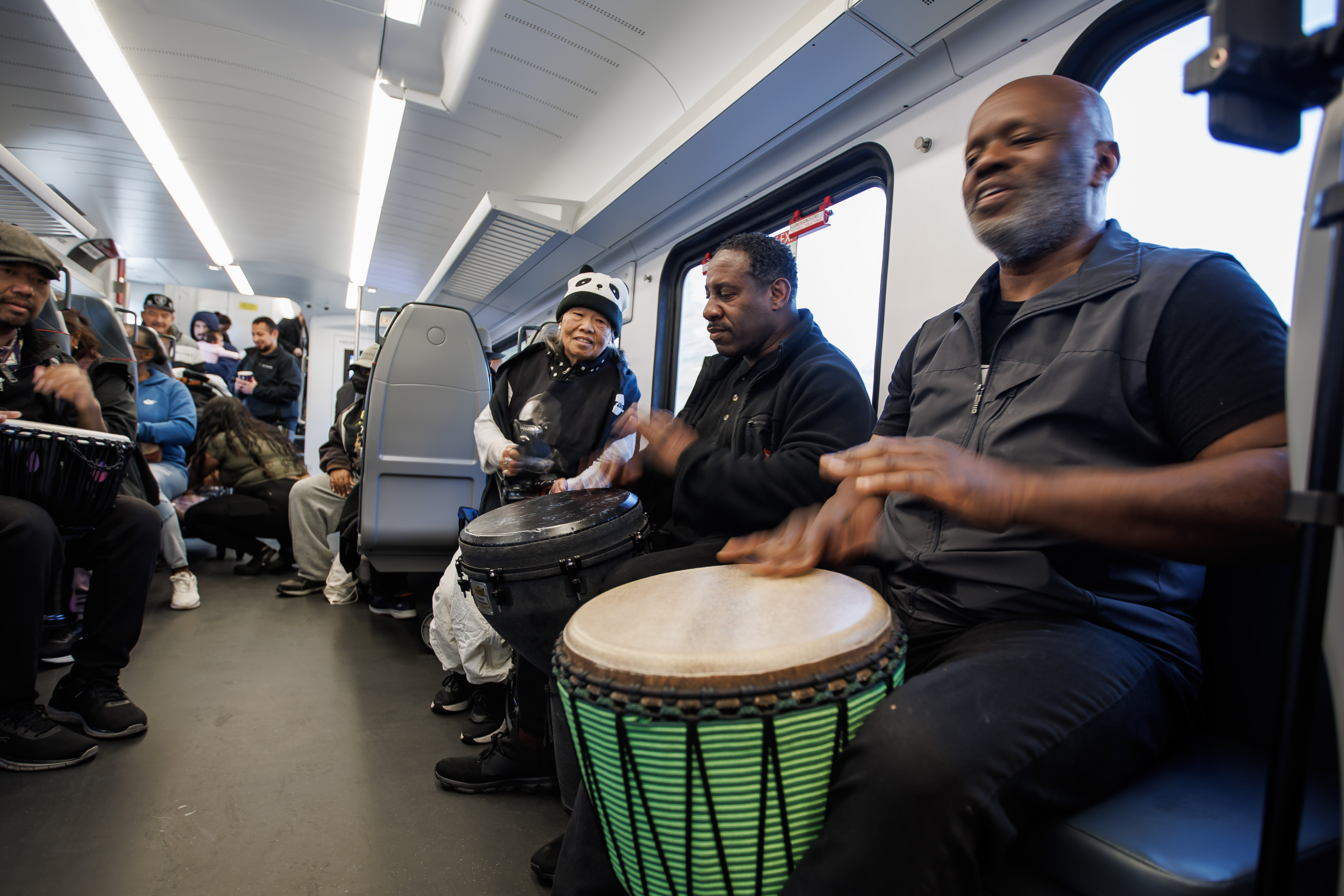 Grady Turner, right, and Greg Carter, center, both of San...