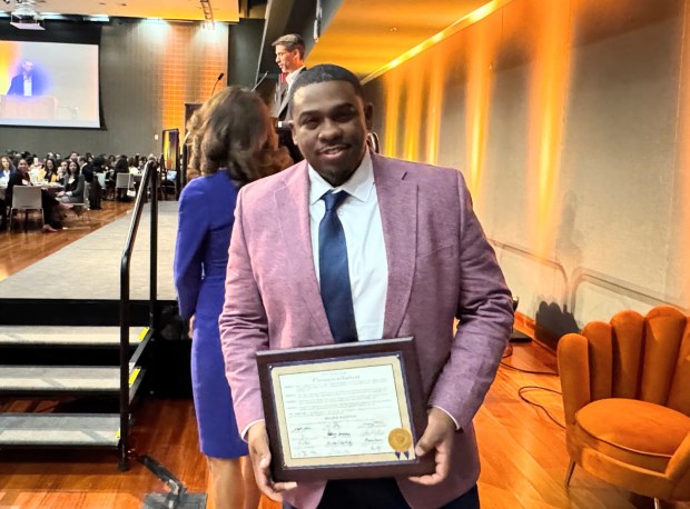 African American Community Service Agency Executive Director Milan Balinton holds a commendation he received from San Jose Mayor Matt Mahan and the city council at the 46th annual Dr. Martin Luther King Jr. Luncheon, held at San Jose State University on Monday, Jan. 19, 2026. (Sal Pizarro/Bay Area News Group)