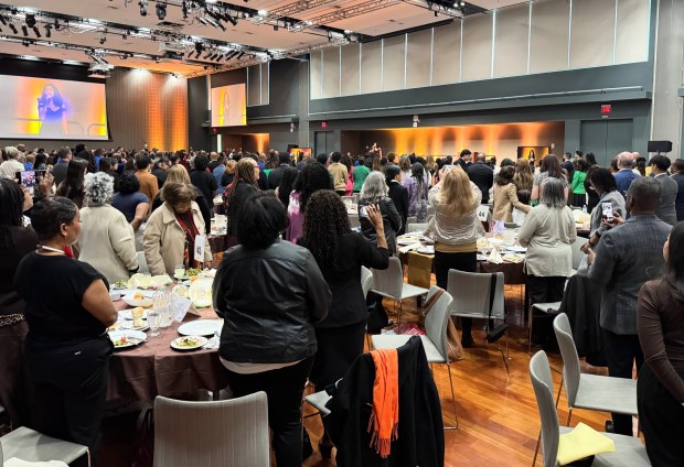 More than 550 people stand during the singing of the Black National Anthem by Victoria Thuy Vi McDowell at the African American Community Service Agency's 46th annual Dr. Martin Luther King Jr. Luncheon, held at San Jose State University on Monday, Jan. 19, 2026. (Sal Pizarro/Bay Area News Group)