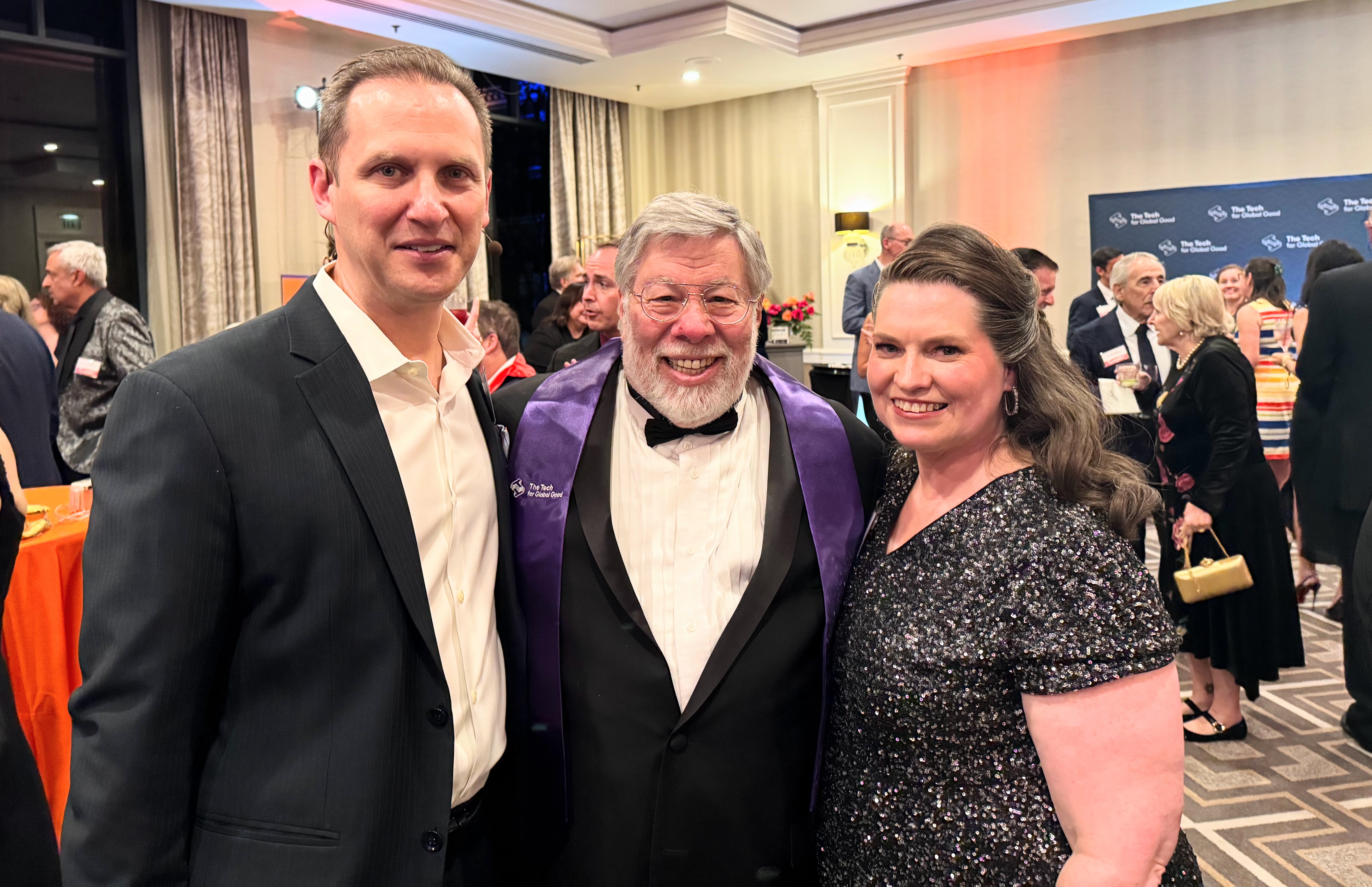Steve Wozniak, center, poses with Sonatus Chief Marketing Officer John...