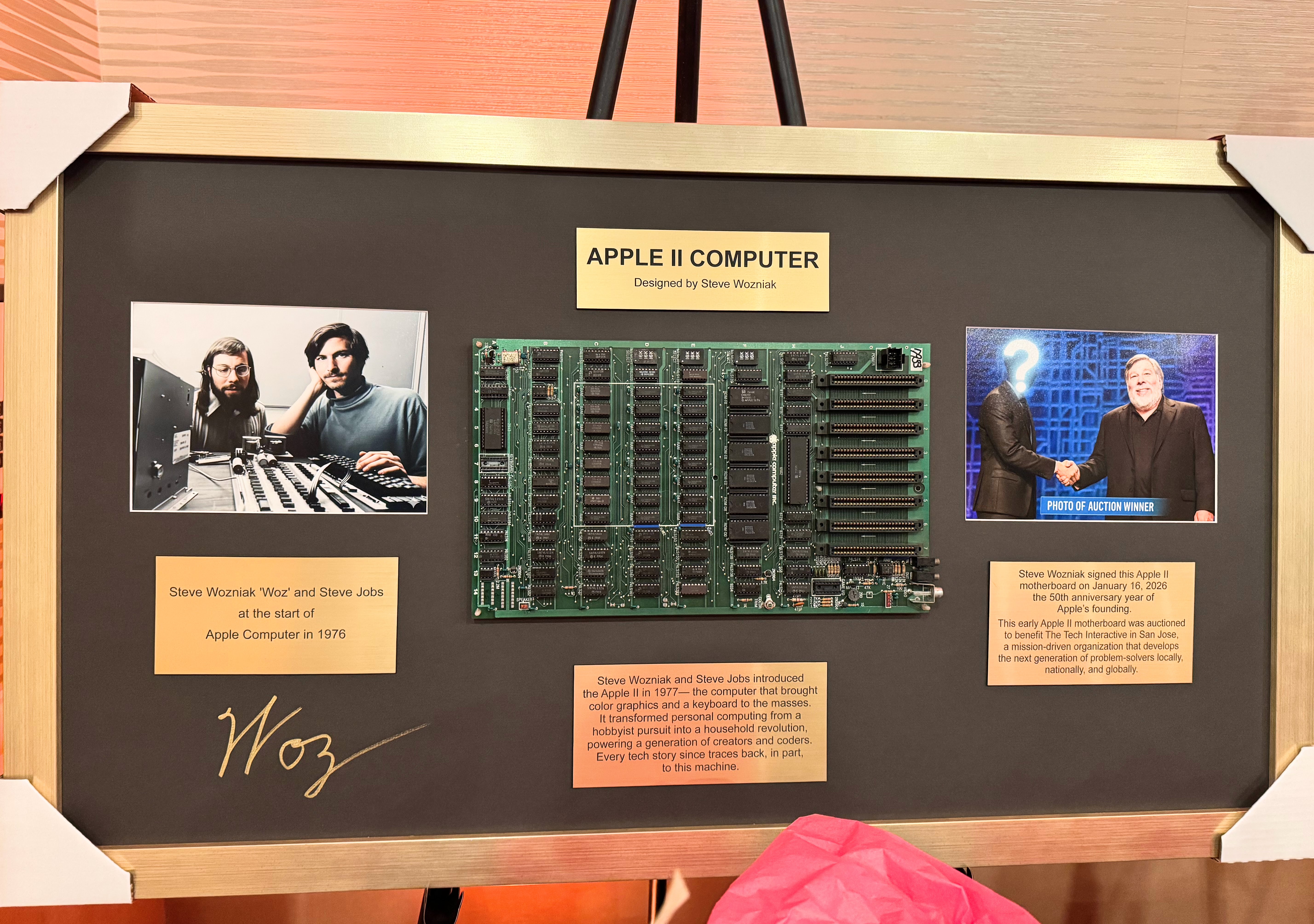 An Apple II board autographed by Steve Wozniak was auctioned...