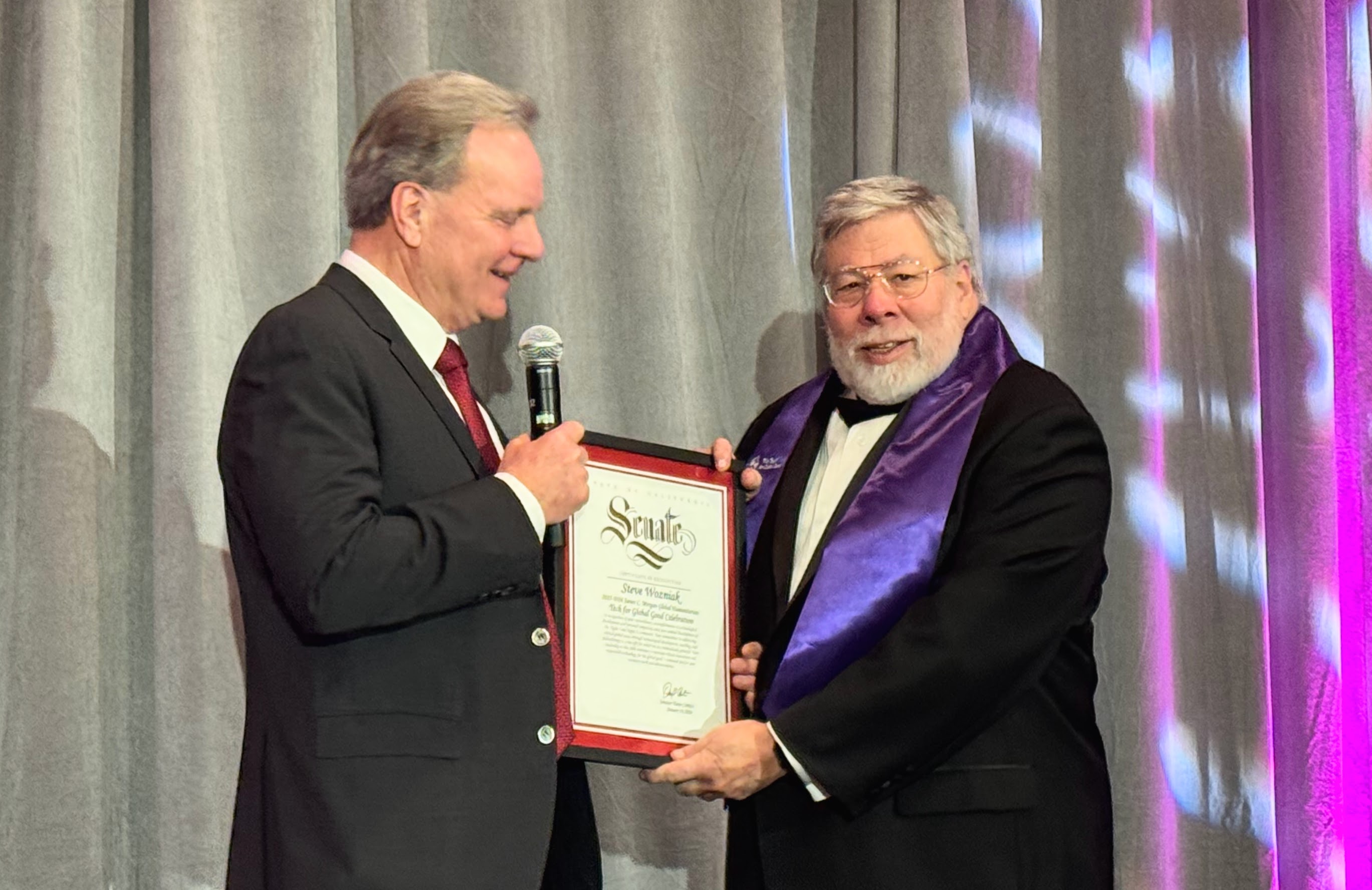 State Sen. Dave Cortese presents Steve Wozniak with a commendation...