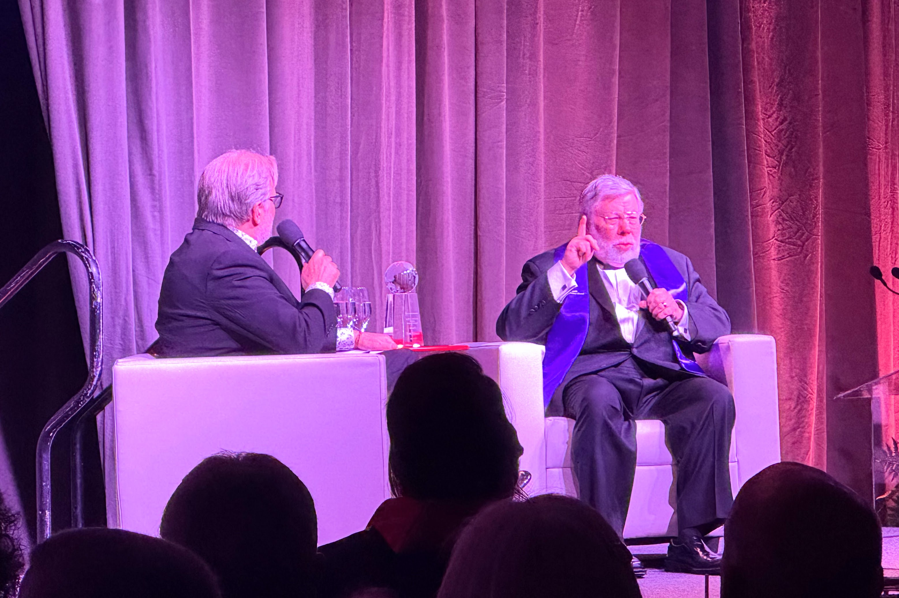 Actor and comedian Drew Carey, left, interviews Steve Wozniak at...
