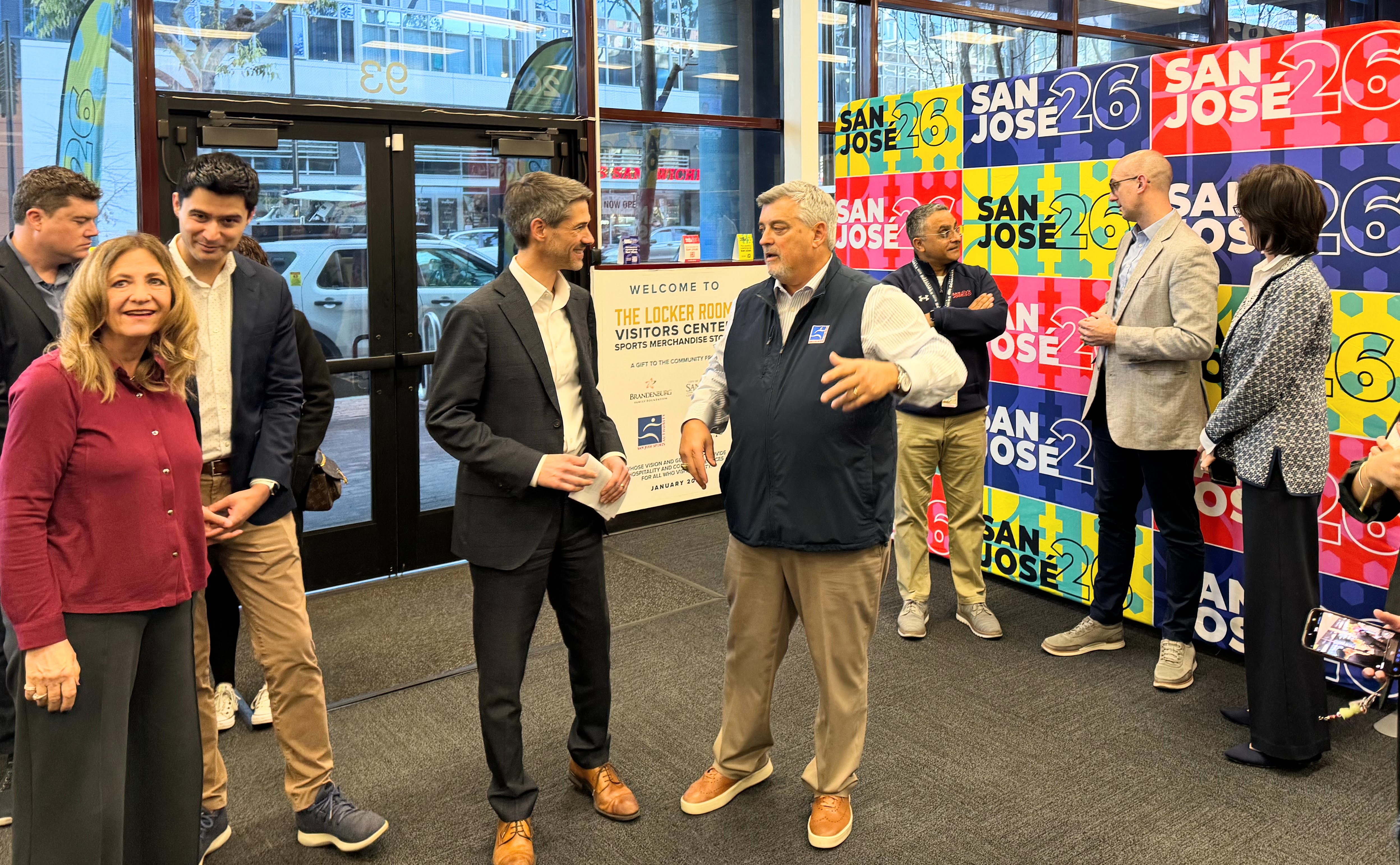 San Jose Mayor Matt Mahan, left, talks to San Jose...