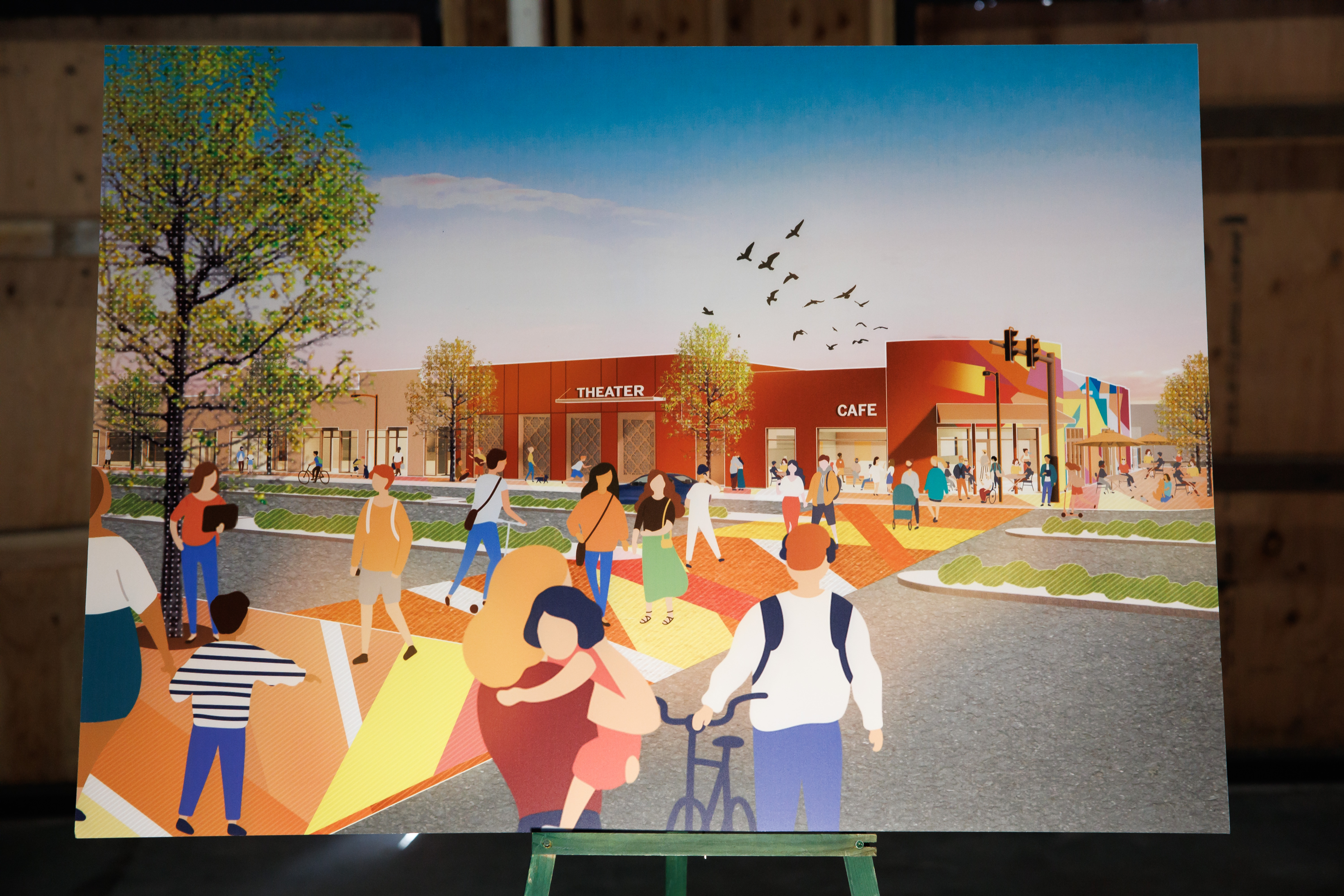 A rendering of La Placita is displayed during a community...