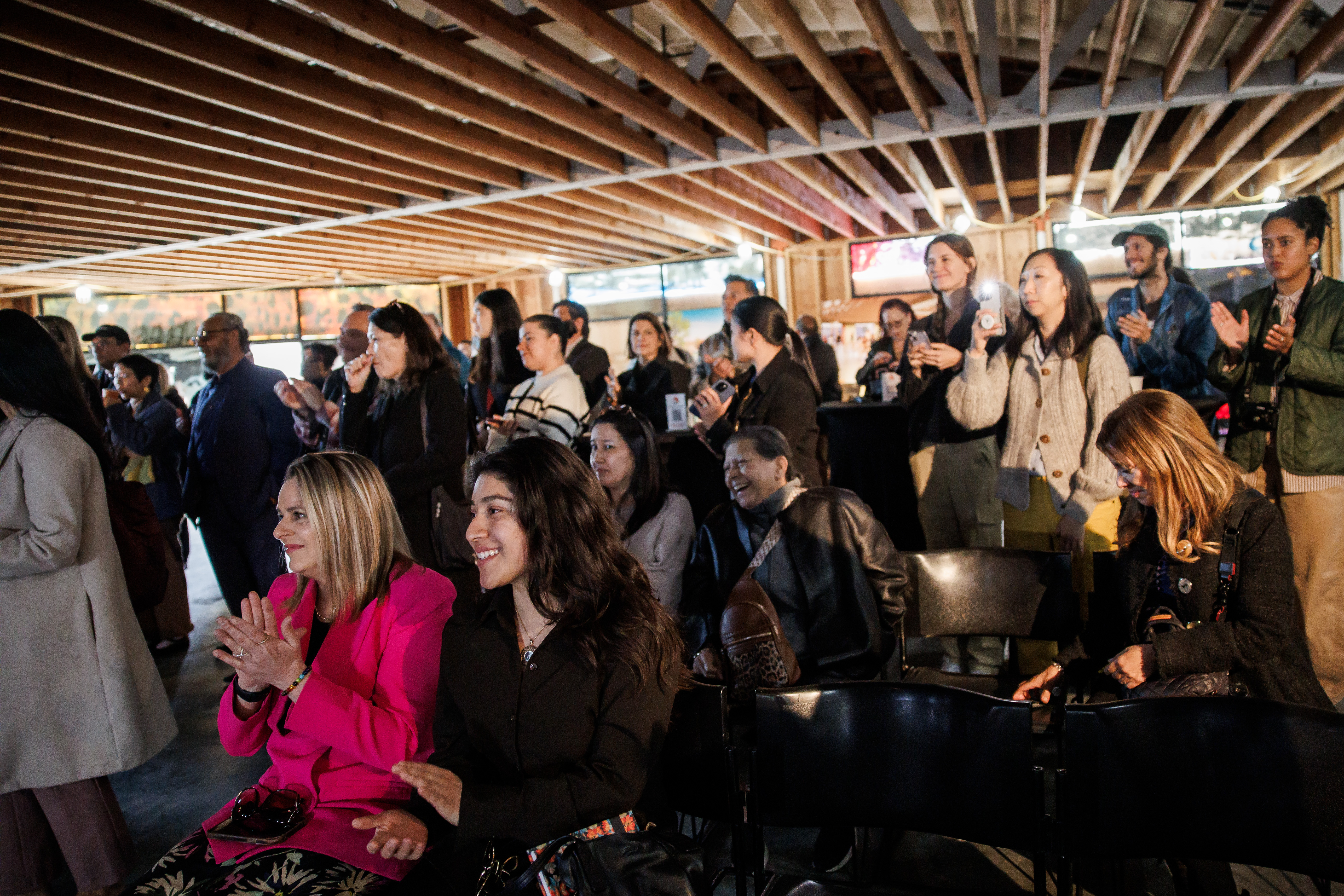 Attendees listen to Jessica Paz-Cedillos, CEO of the School of...