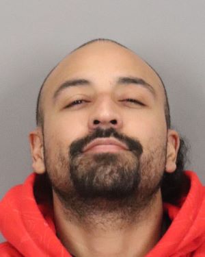Edward Isaiah Macias, 29, of Santa Nella, has been arrested and charged with two armed robberies and a carjacking in San Jose that preceded a Jan. 21, 2026 police chase in which his alleged accomplice Mohamed Husien led authorities on a chase to Hollister where Husien shot at police officers in two confrontations before he returned to San Jose and wounded a police sergeant before he was killed in a downtown gunfight. (San Jose Police Dept.)