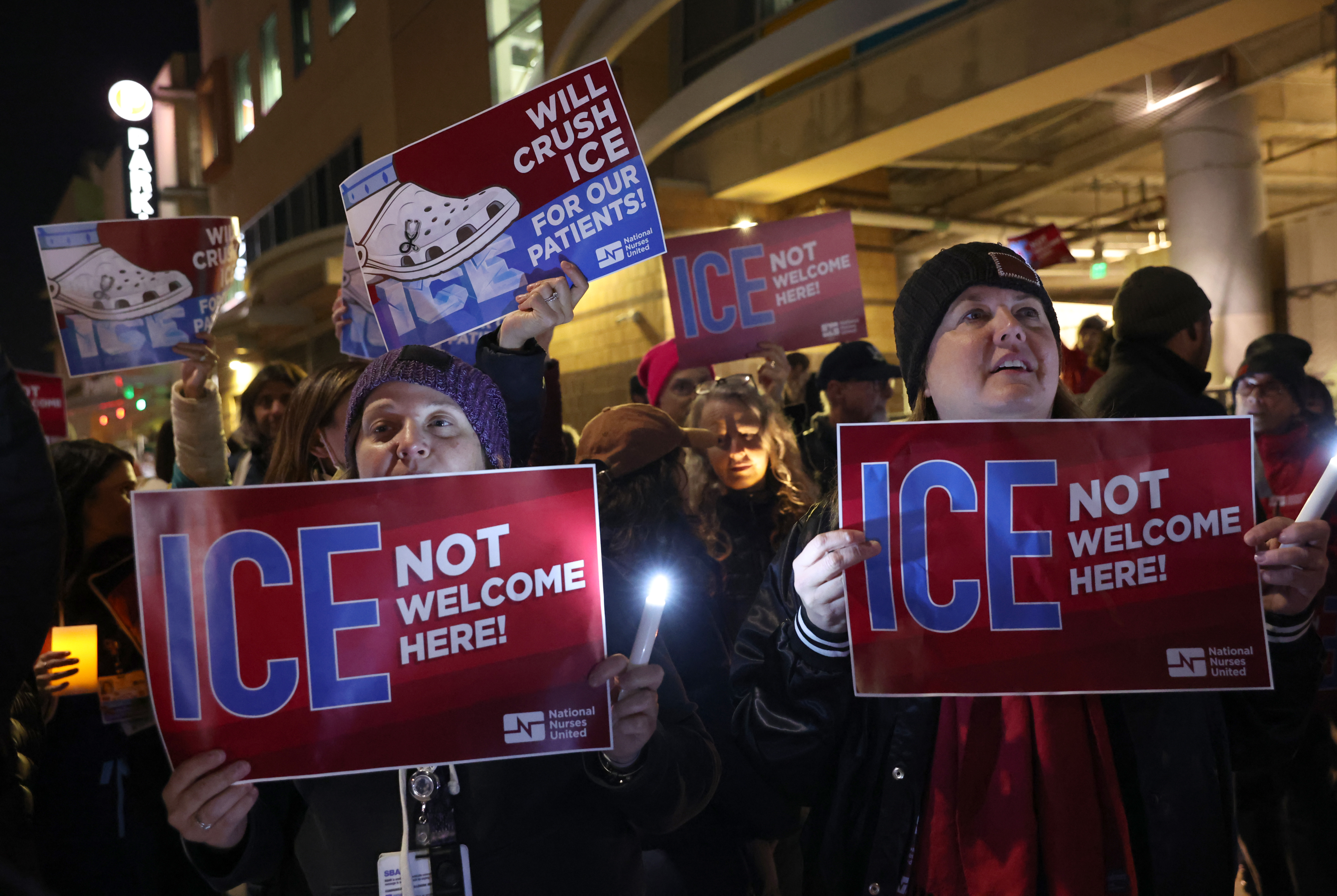 Registered nurse Michelle Trautman, and friend Hannah Pelletier, from right,...