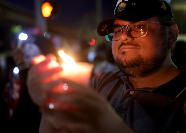Aaron Cortez, of Oakland, attends a protest outside of UCSF Benioff Children's Hospital Oakland in Oakland, Calif., on Monday, Jan. 26, 2026. Healthcare professionals and others are demanding justice and the abolishment of U.S. Immigration and Customs Enforcement (ICE ) in the wake of the killing of Veteran's Administration nurse Alex Pretti in Minneapolis. (Jane Tyska/Bay Area News Group)l