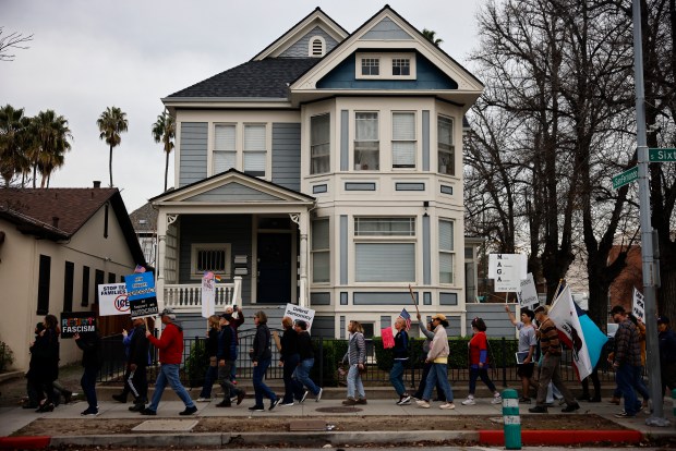 Protesters head north on South 6th Street as they participate in the "South Bay Free America Walkout" at San Jose City Hall in downtown San Jose, Calif., on Tuesday, Jan. 20 2026. (Nhat V. Meyer/Bay Area News Group)