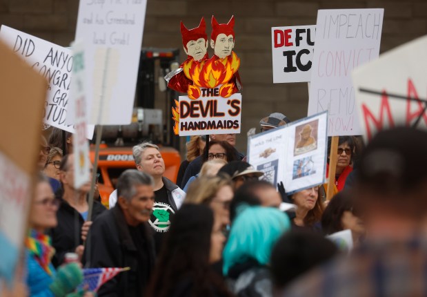 Protesters participate in the "South Bay Free America Walkout" at San Jose City Hall in downtown San Jose, Calif., on Tuesday, Jan. 20 2026. (Nhat V. Meyer/Bay Area News Group)