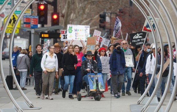 Protesters participate in the "South Bay Free America Walkout" at San Jose City Hall in downtown San Jose, Calif., on Tuesday, Jan. 20 2026. (Nhat V. Meyer/Bay Area News Group)