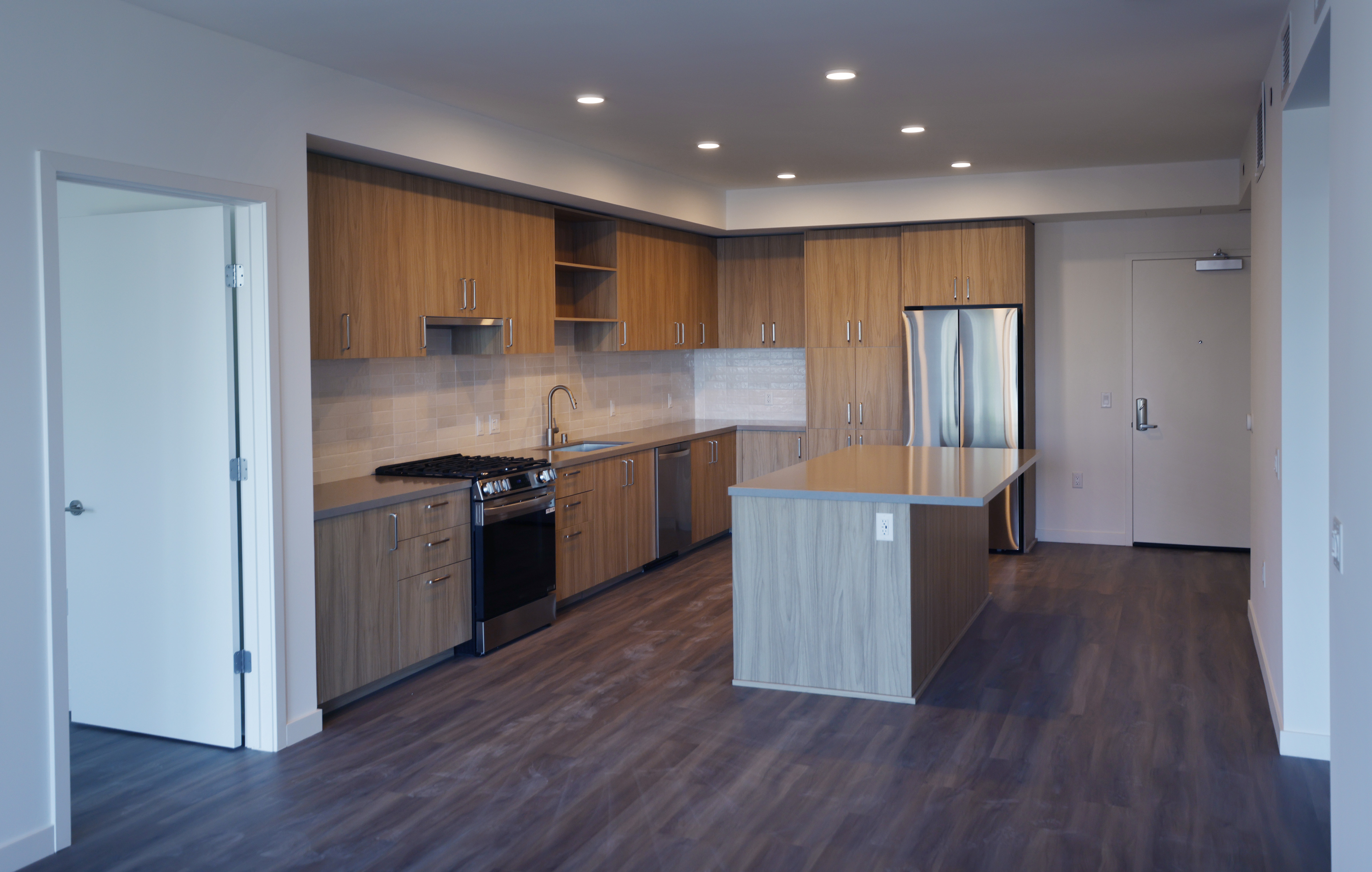 A kitchen and dining area in an apartment at The...
