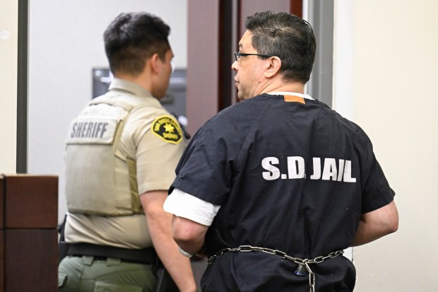 Jesse Wagner is taken out of court after his sentencing hearing in Chula Vista Superior Court Jan. 7, 2026 in San Diego, Calif. (Photo by Denis Poroy)