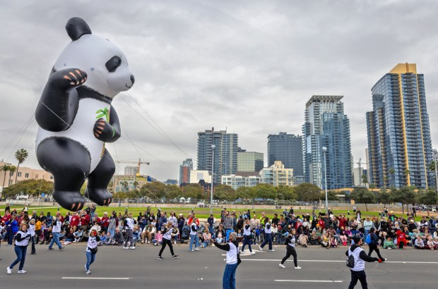 Thousands gather to watch marching bands, floats, giant balloons and other entertainment during the Port of San Diego Holiday Bowl Parade on Friday, Dec. 27, 2024 in San Diego, California. (Ana Ramirez / The San Diego Union-Tribune)