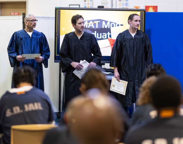 On Tuesday, Dec. 16, 2025, Francis Morales, Vincent Facciuto and Eric Klein (left to right) were recognized at a graduation ceremony for completing the Vista jail's medication-assisted treatment program. (San Diego Sheriff's Office)