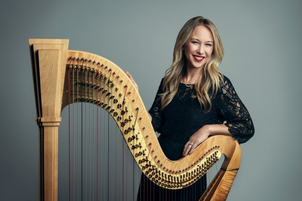 San Diego Symphony harpist Julie Phillips this year celebrates her 20th anniversary with the orchestra. and will be the featured soloist at its Feb. 5 and 6 concerts. (Courtesy San Diego Symphony)